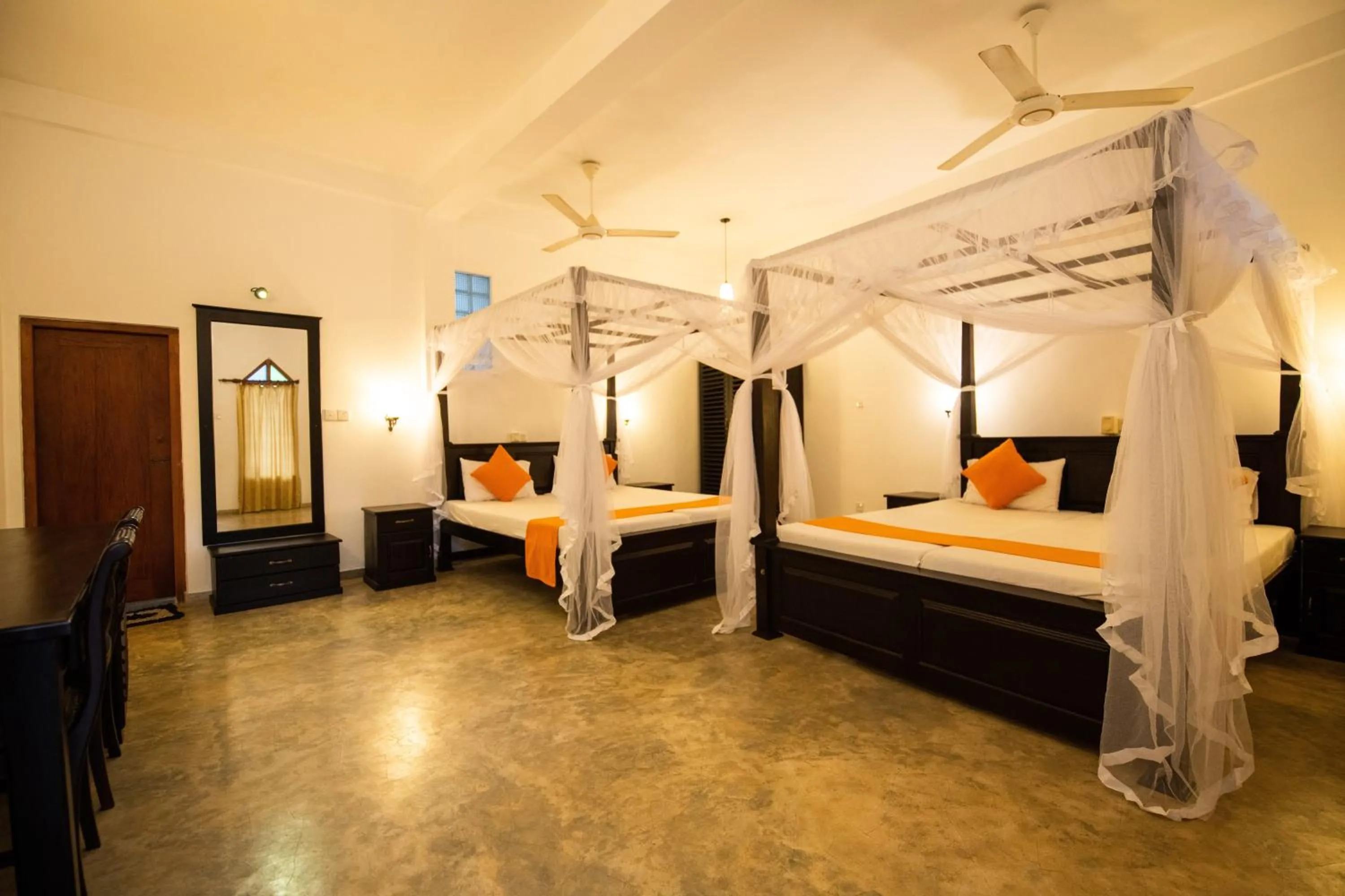 Bed in International Beach Hotel & Restaurant