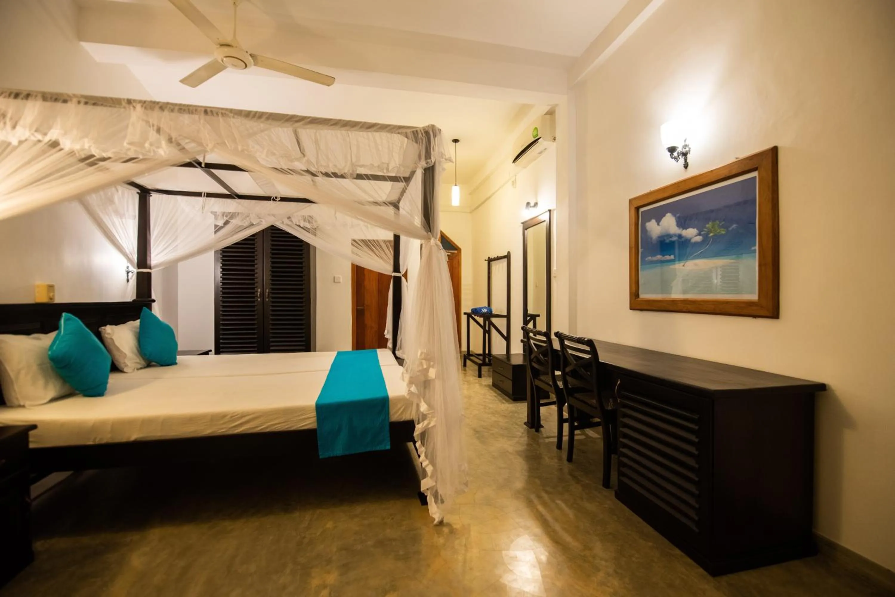 Bed in International Beach Hotel & Restaurant