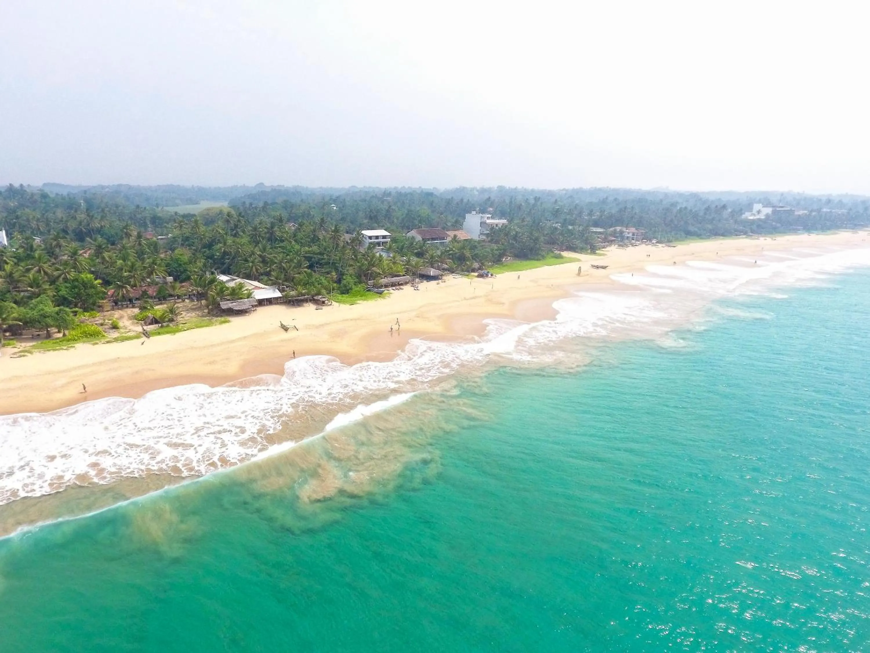 Beach in International Beach Hotel & Restaurant