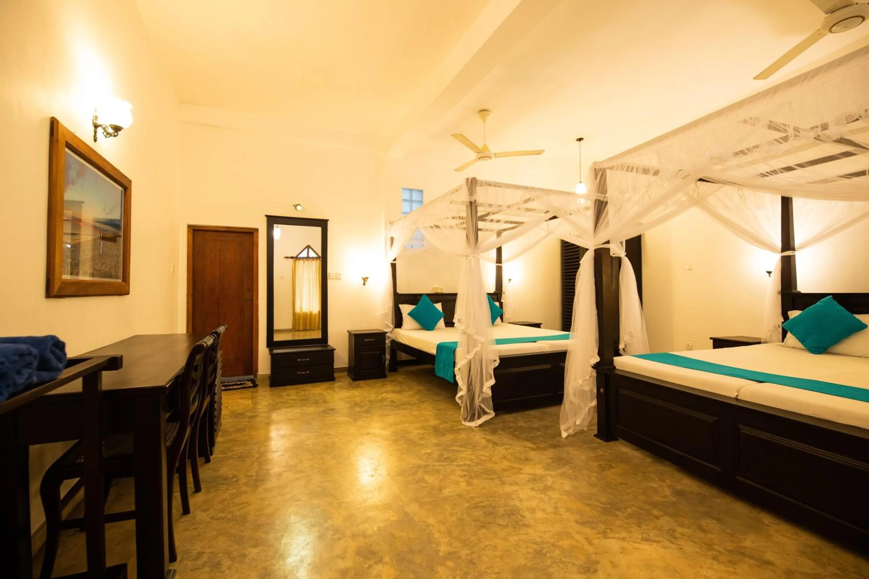 Bed in International Beach Hotel & Restaurant