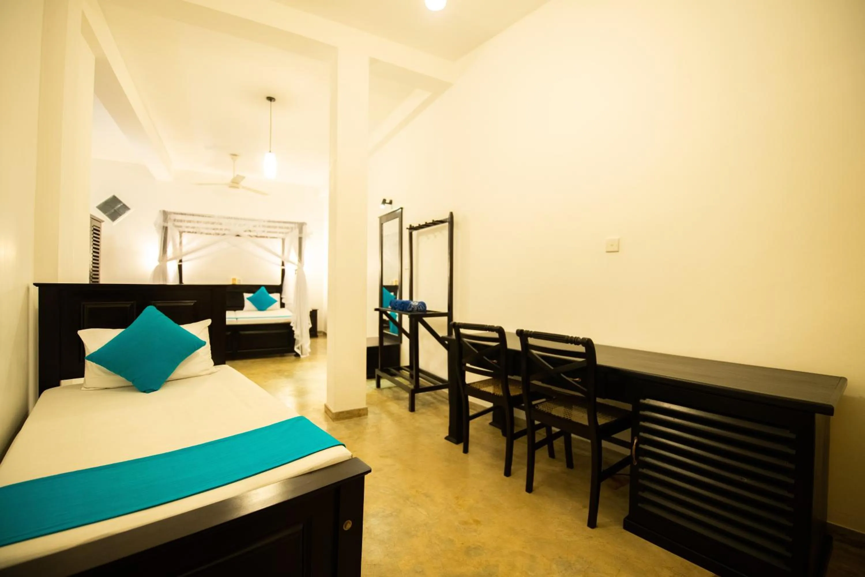 Bed in International Beach Hotel & Restaurant