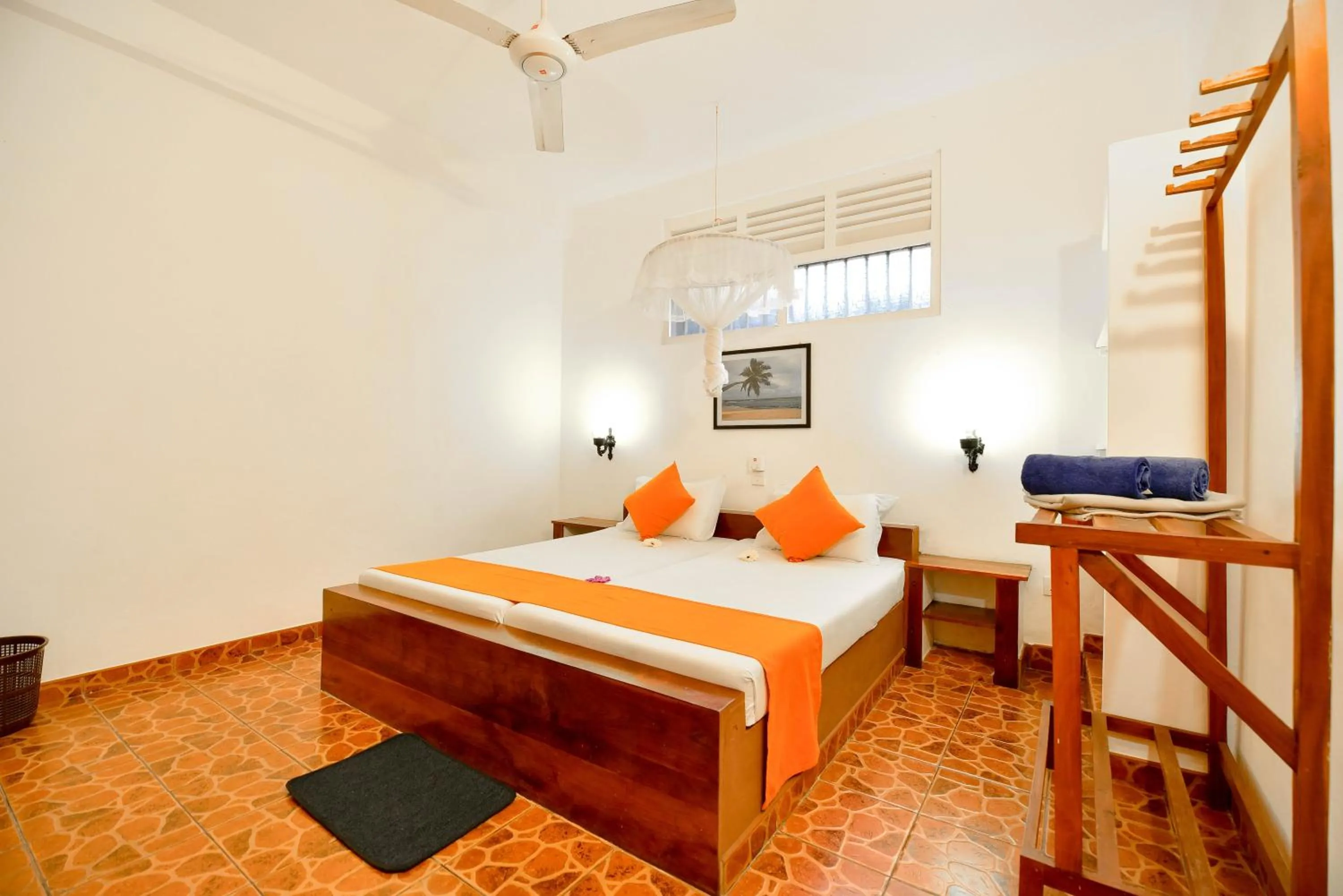 Bed in International Beach Hotel & Restaurant