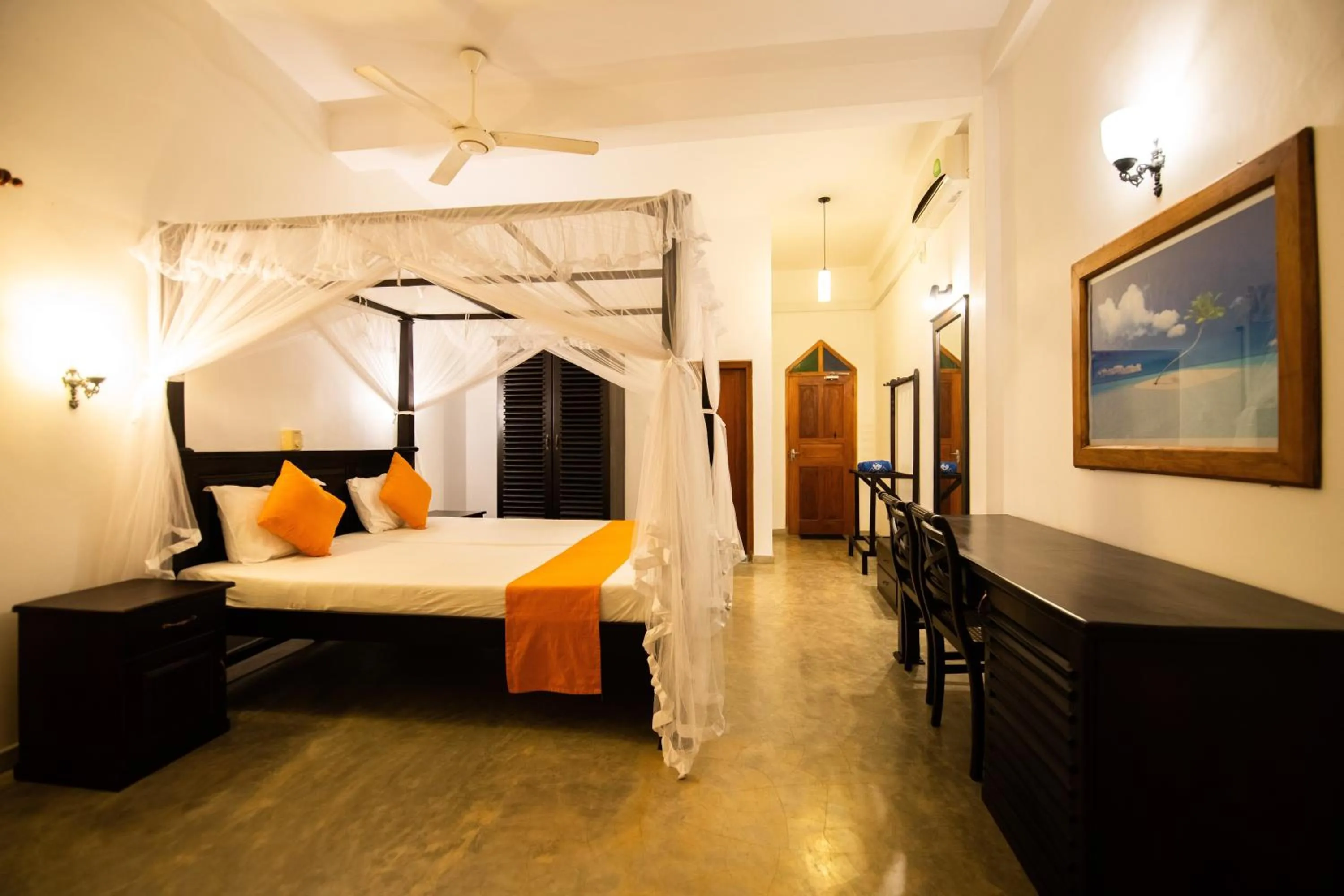 Bed in International Beach Hotel & Restaurant