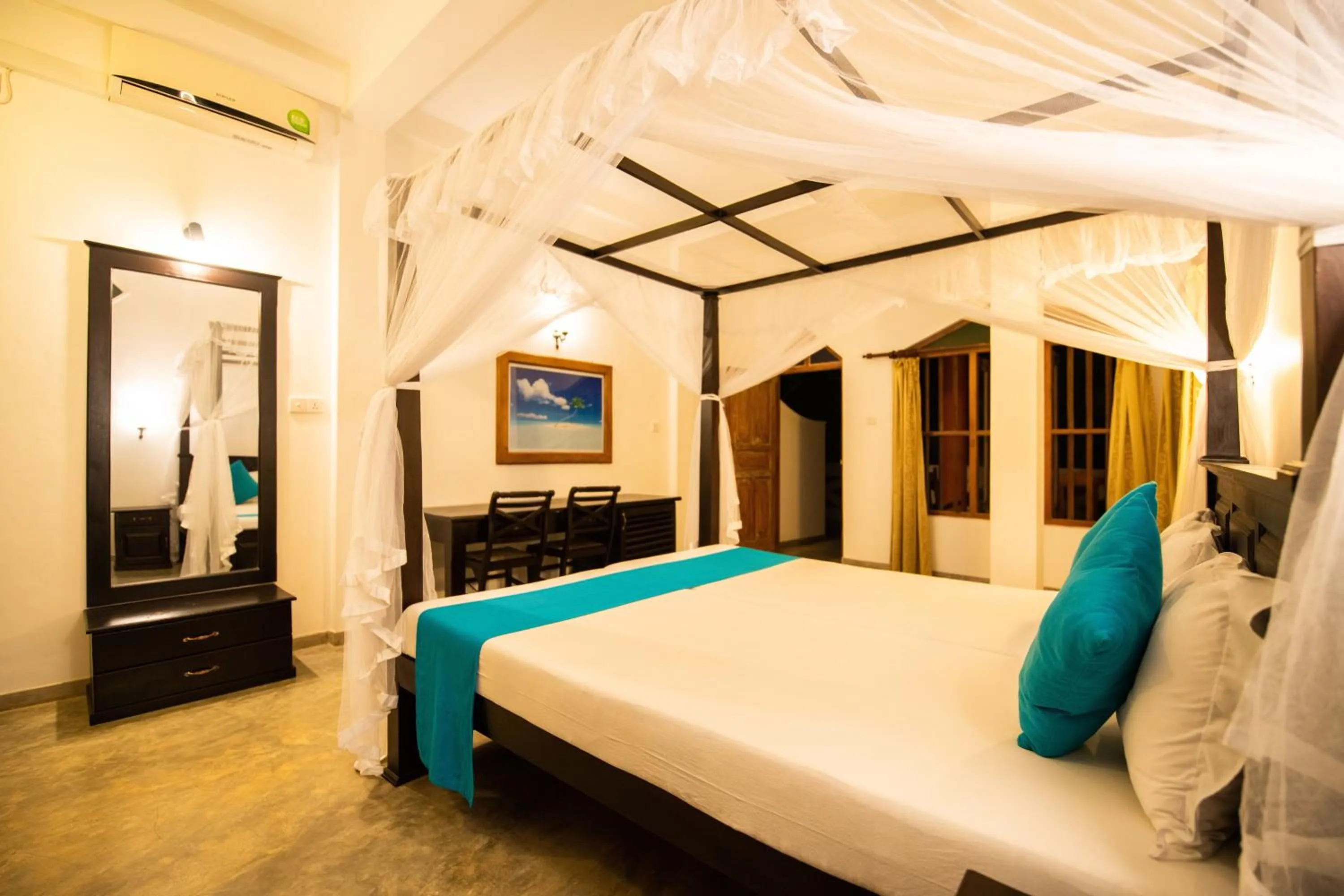 Bed in International Beach Hotel & Restaurant