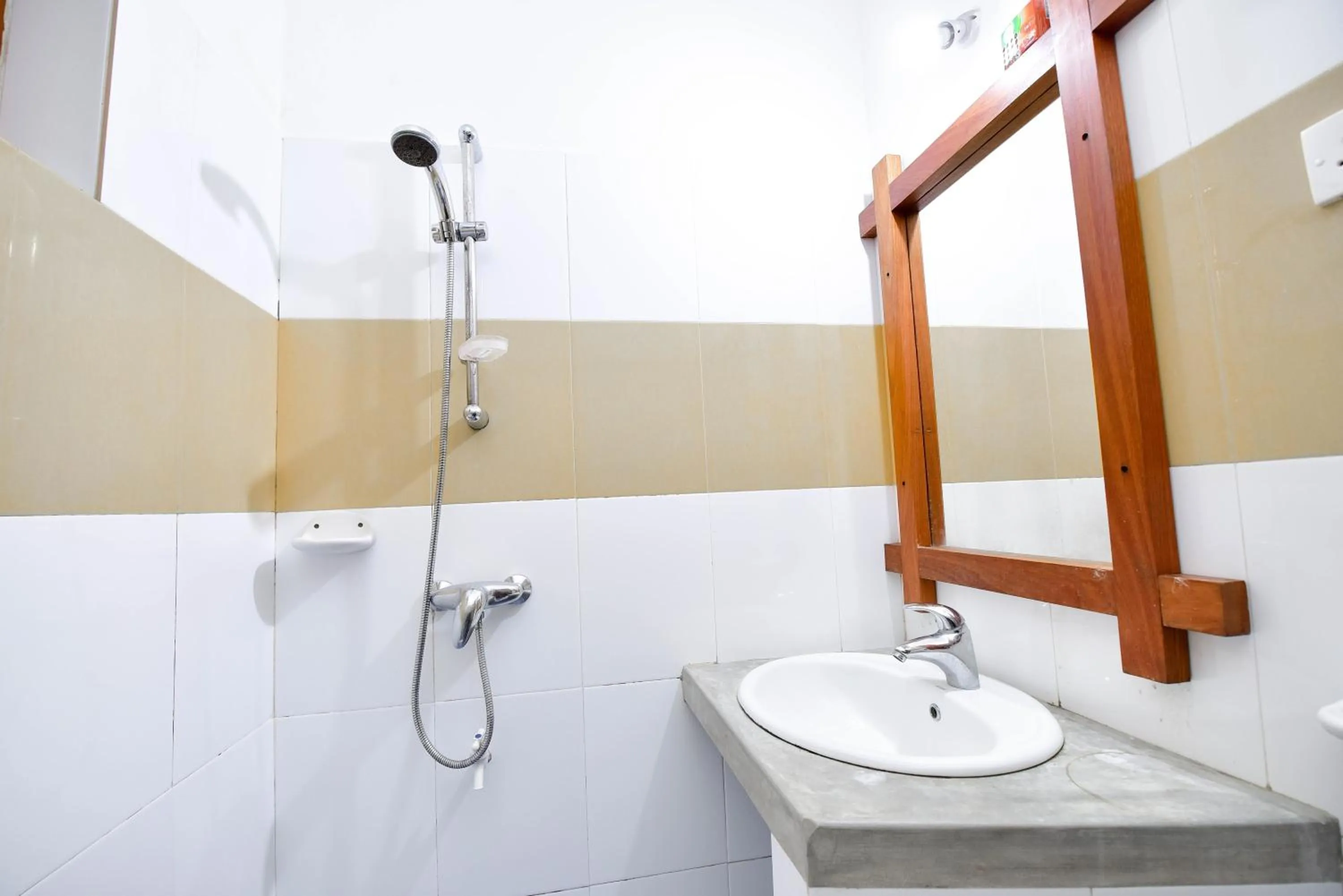 Toilet in International Beach Hotel & Restaurant