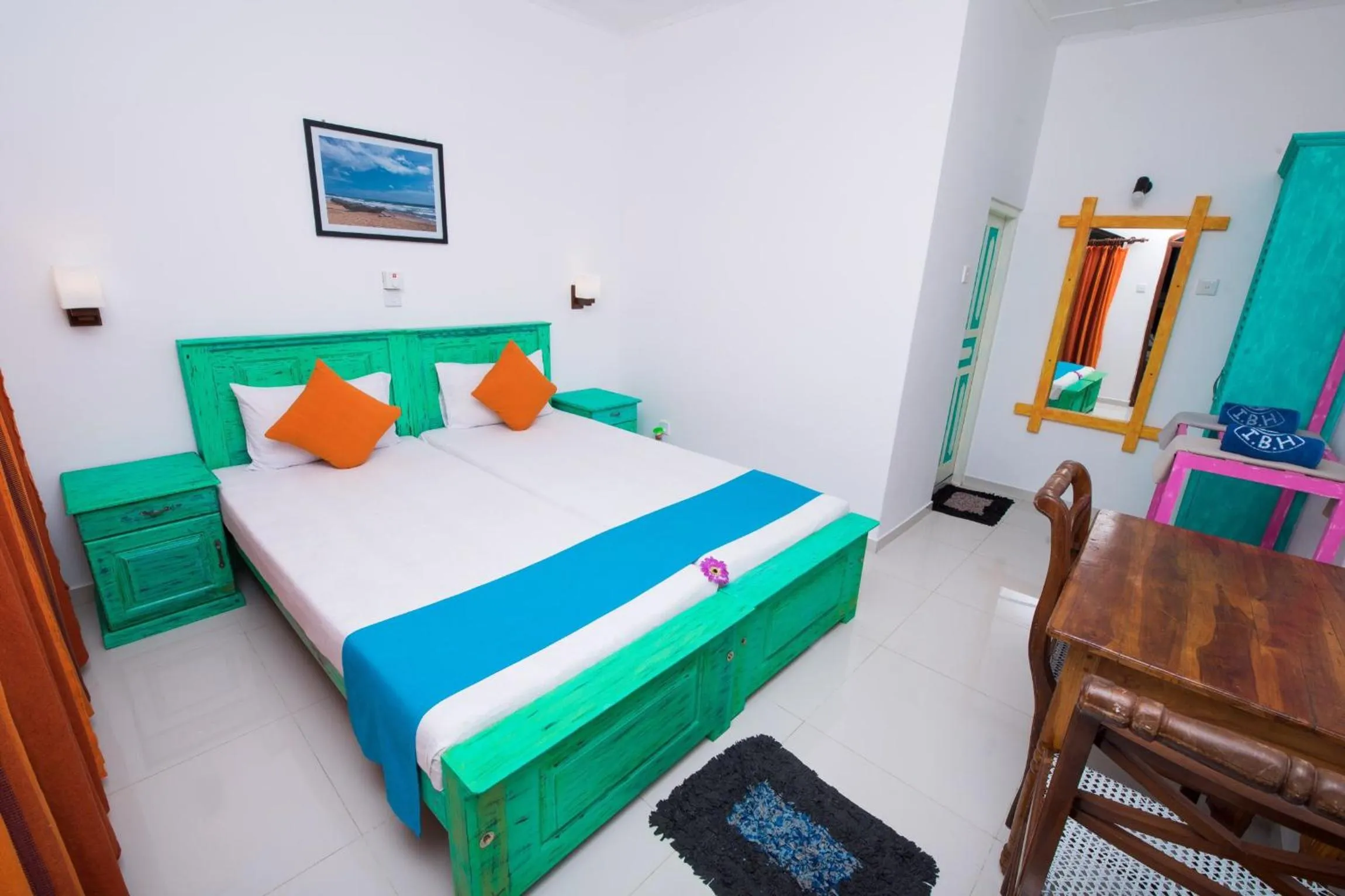 Bed in International Beach Hotel & Restaurant