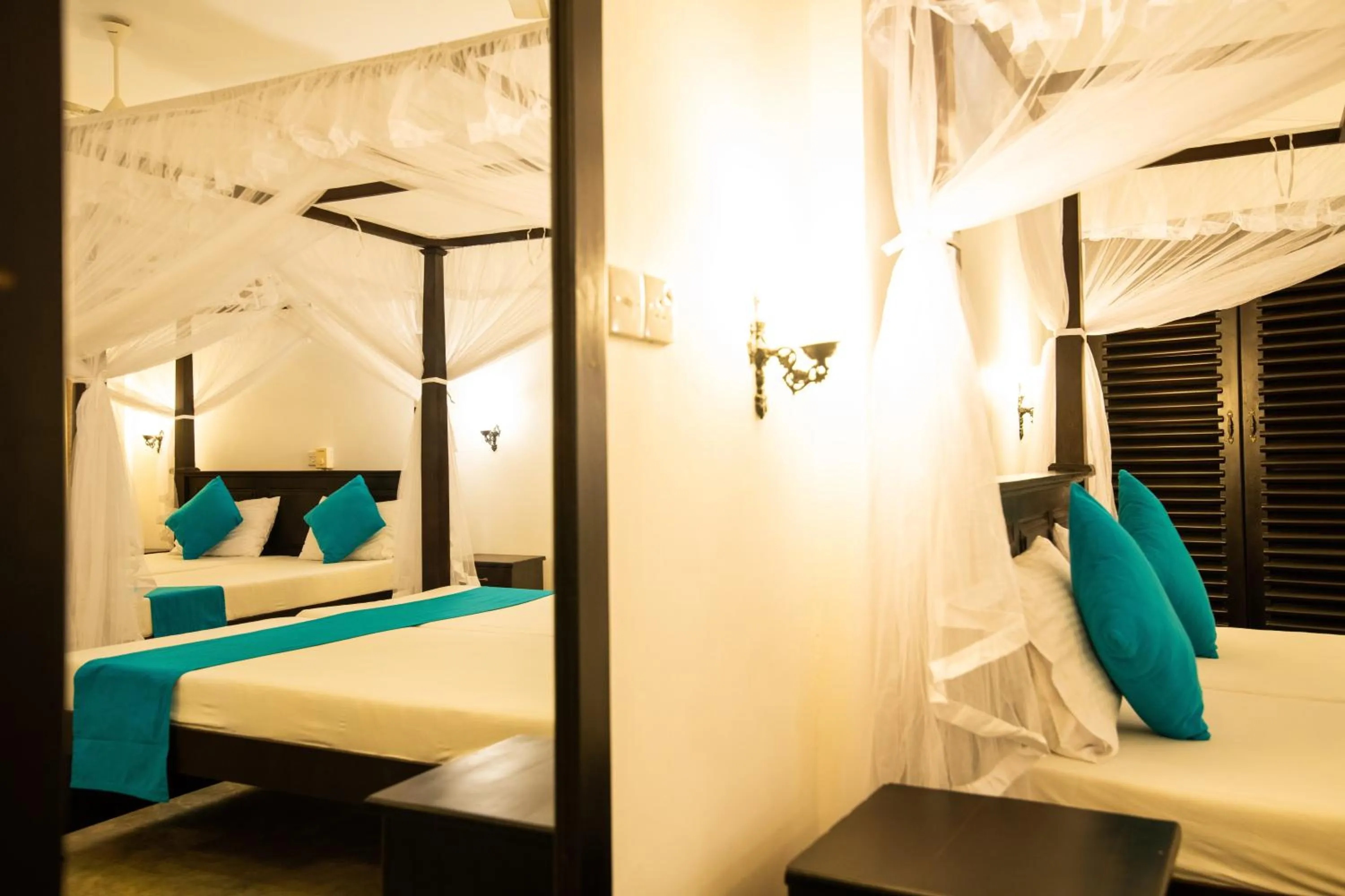 Bed in International Beach Hotel & Restaurant