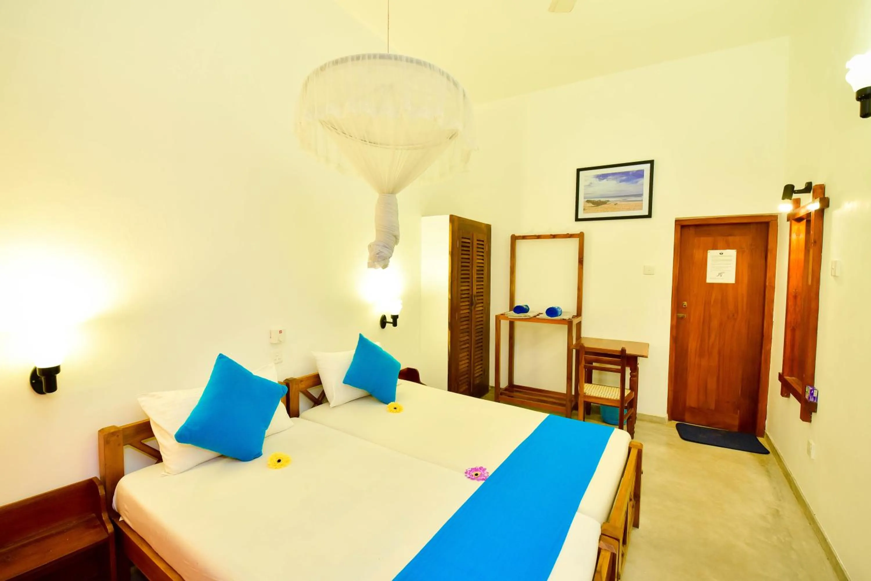 Bed in International Beach Hotel & Restaurant