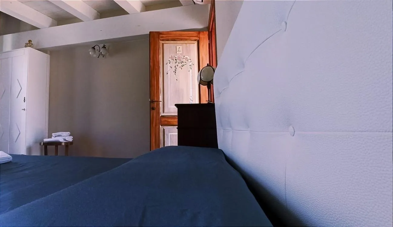 Bed in Donnaciccina Accomodation