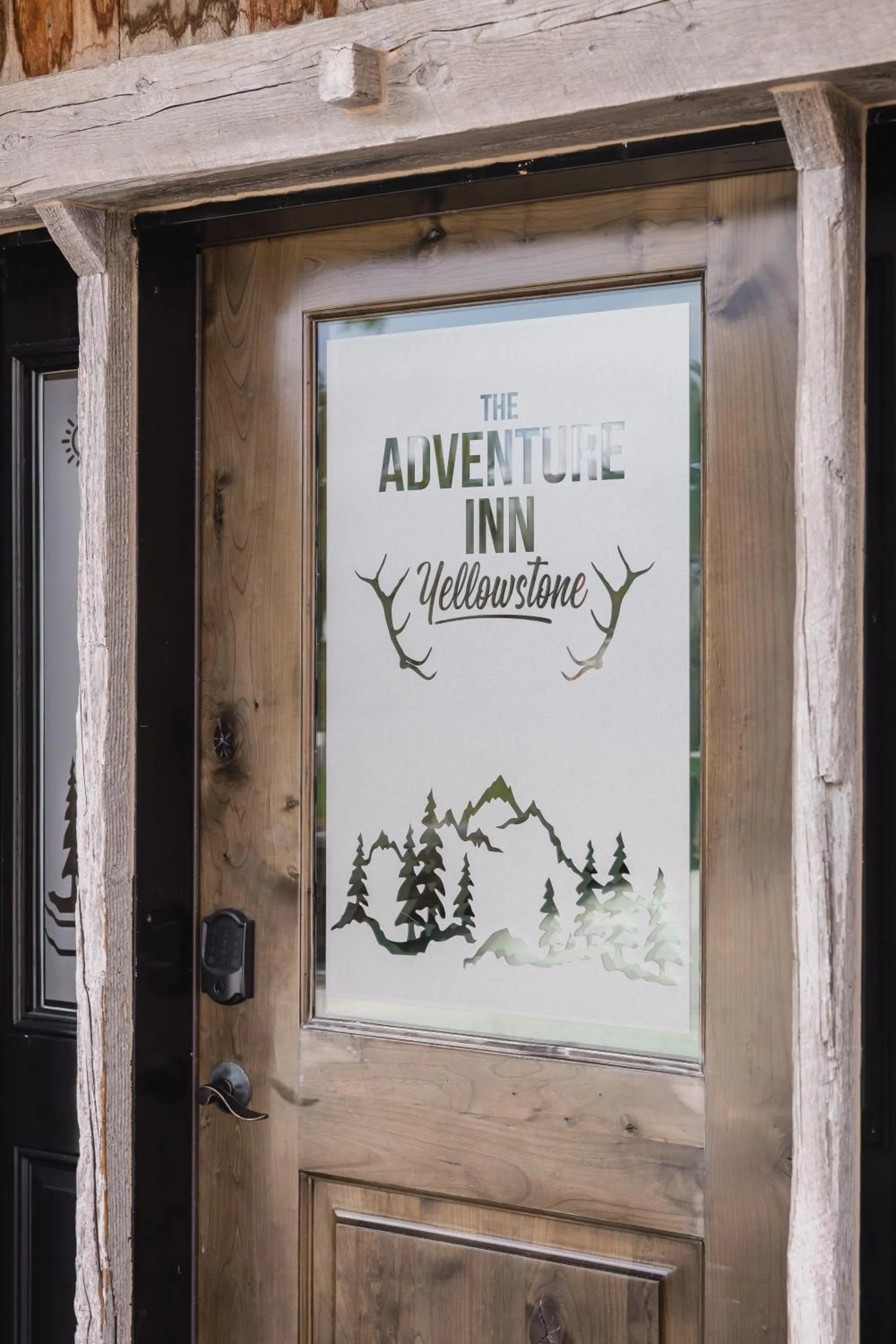 Property logo or sign in The Adventure Inn Yellowstone