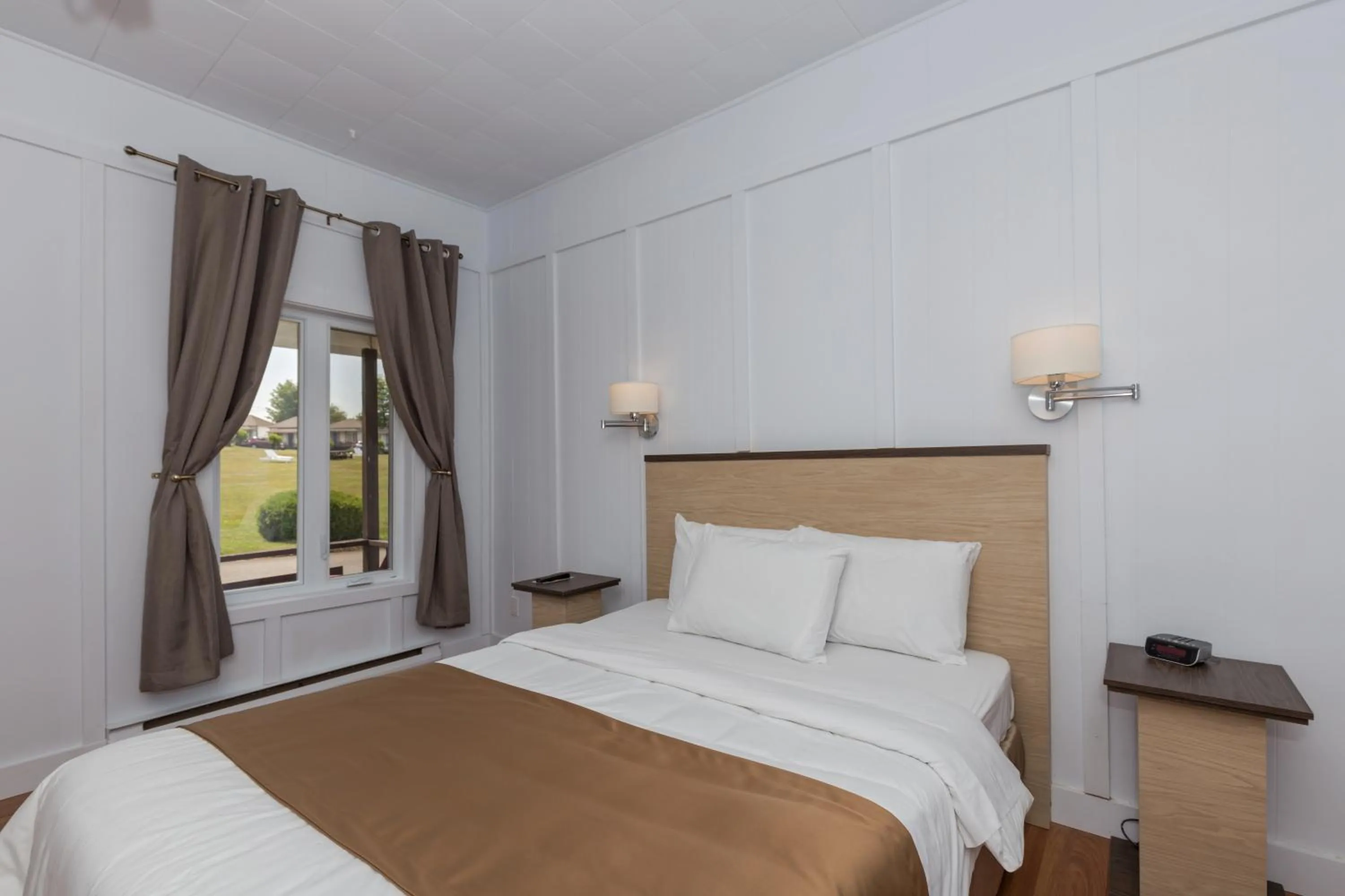 Bed in Motel au Fleuve d'Argent