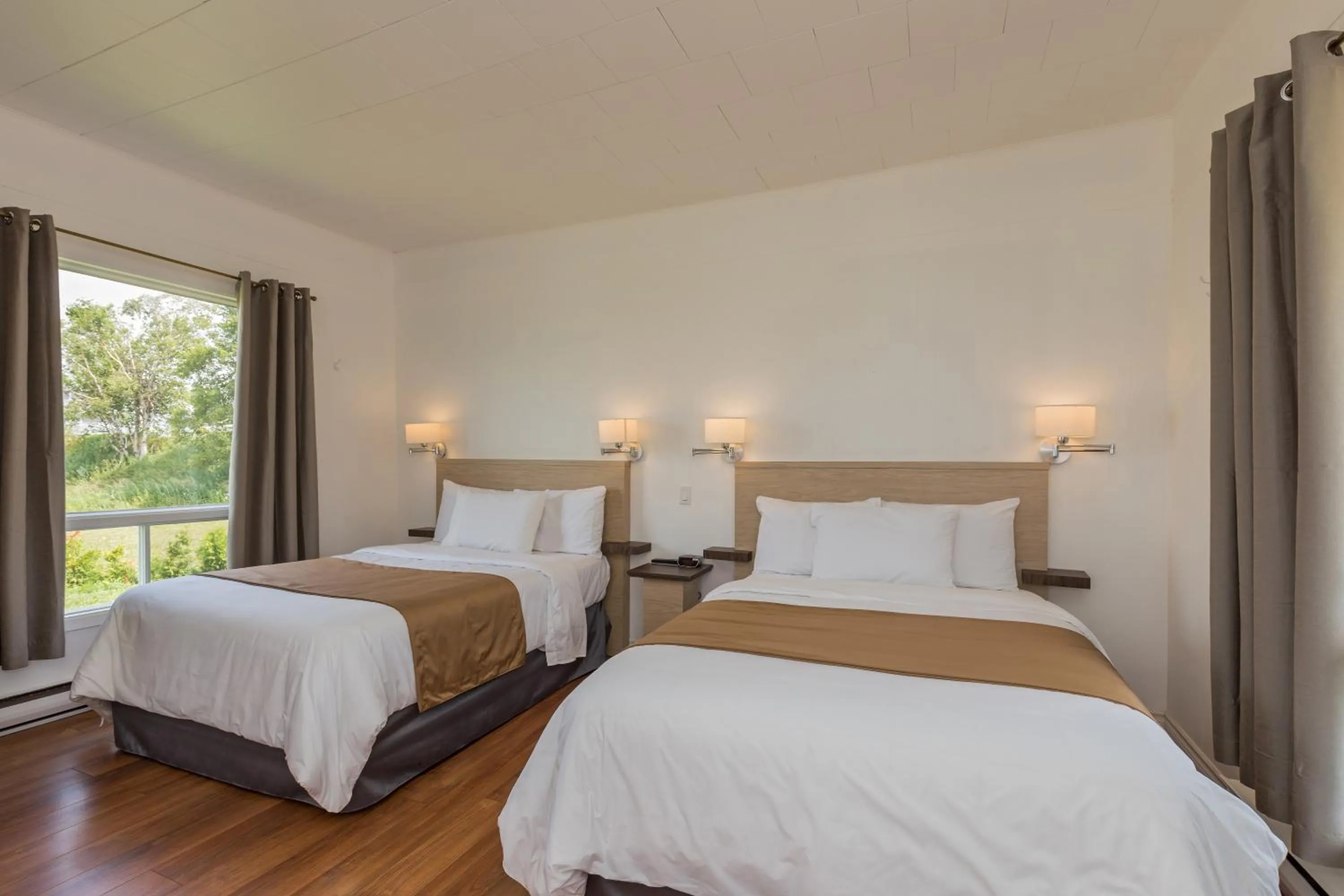 Bed in Motel au Fleuve d'Argent