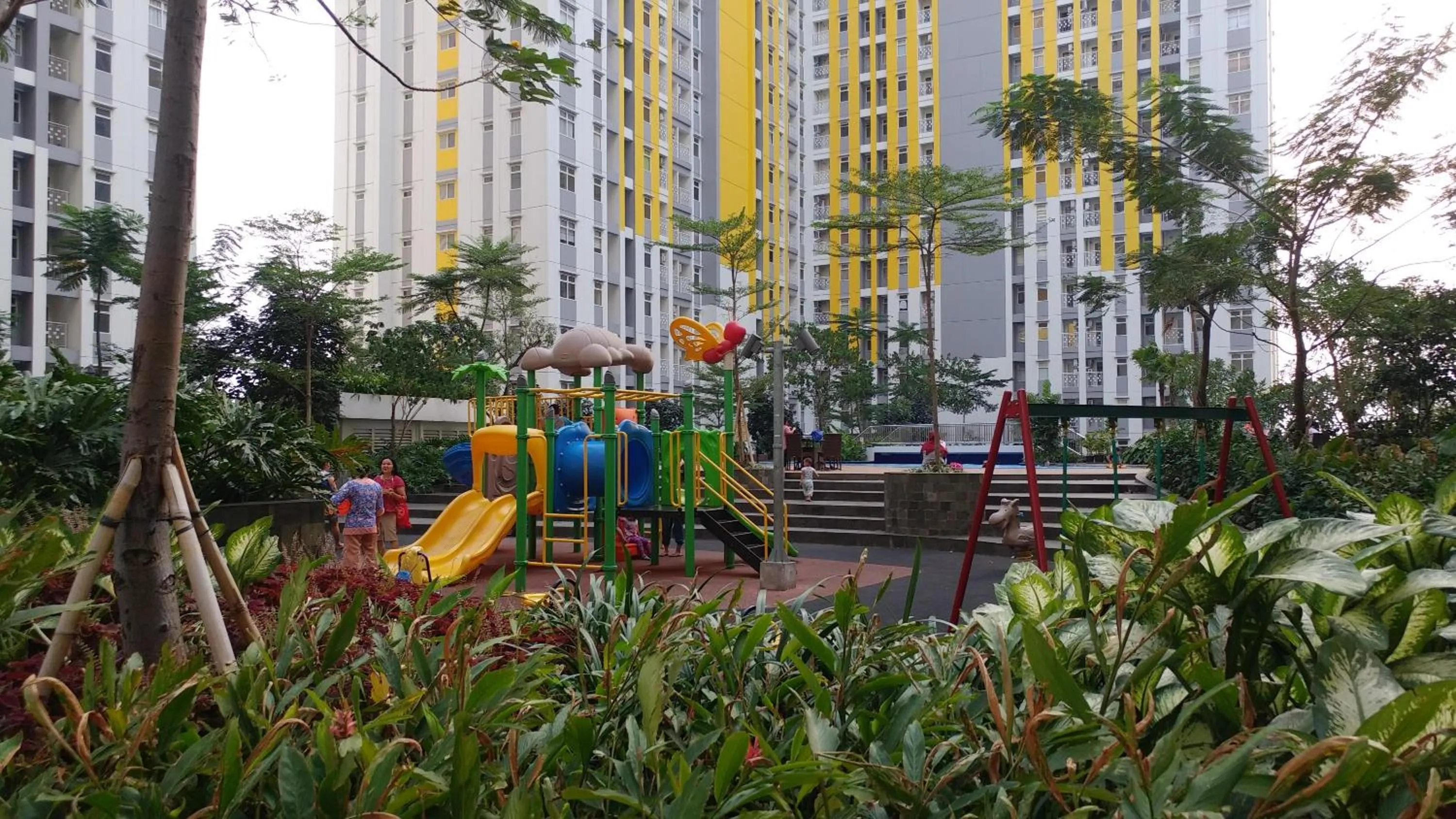 Property building in Minimalist 2BR Apartment The Springlake Summarecon By Travelio