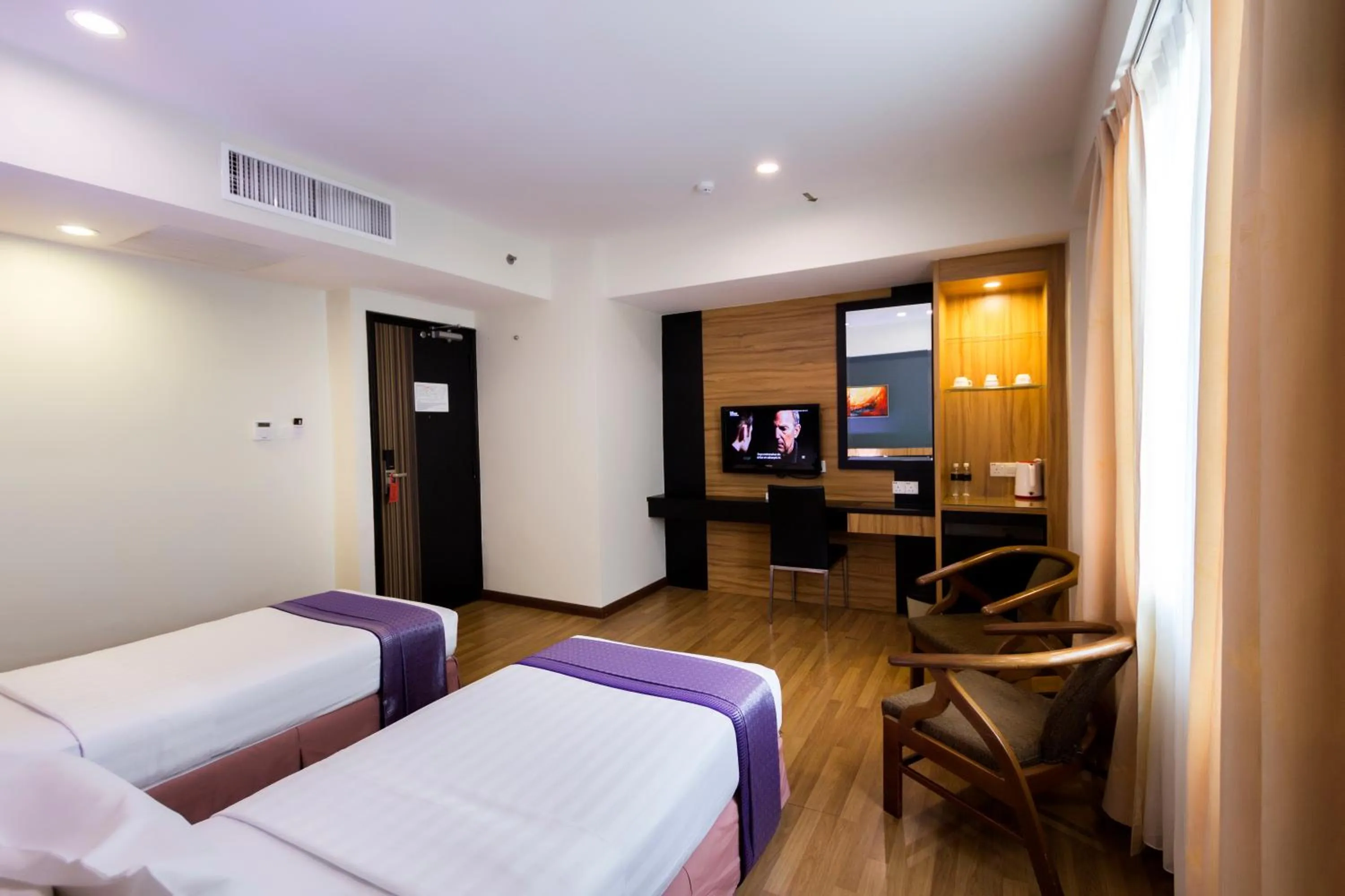 Photo of the whole room, Bed in Mariner Hotel Labuan