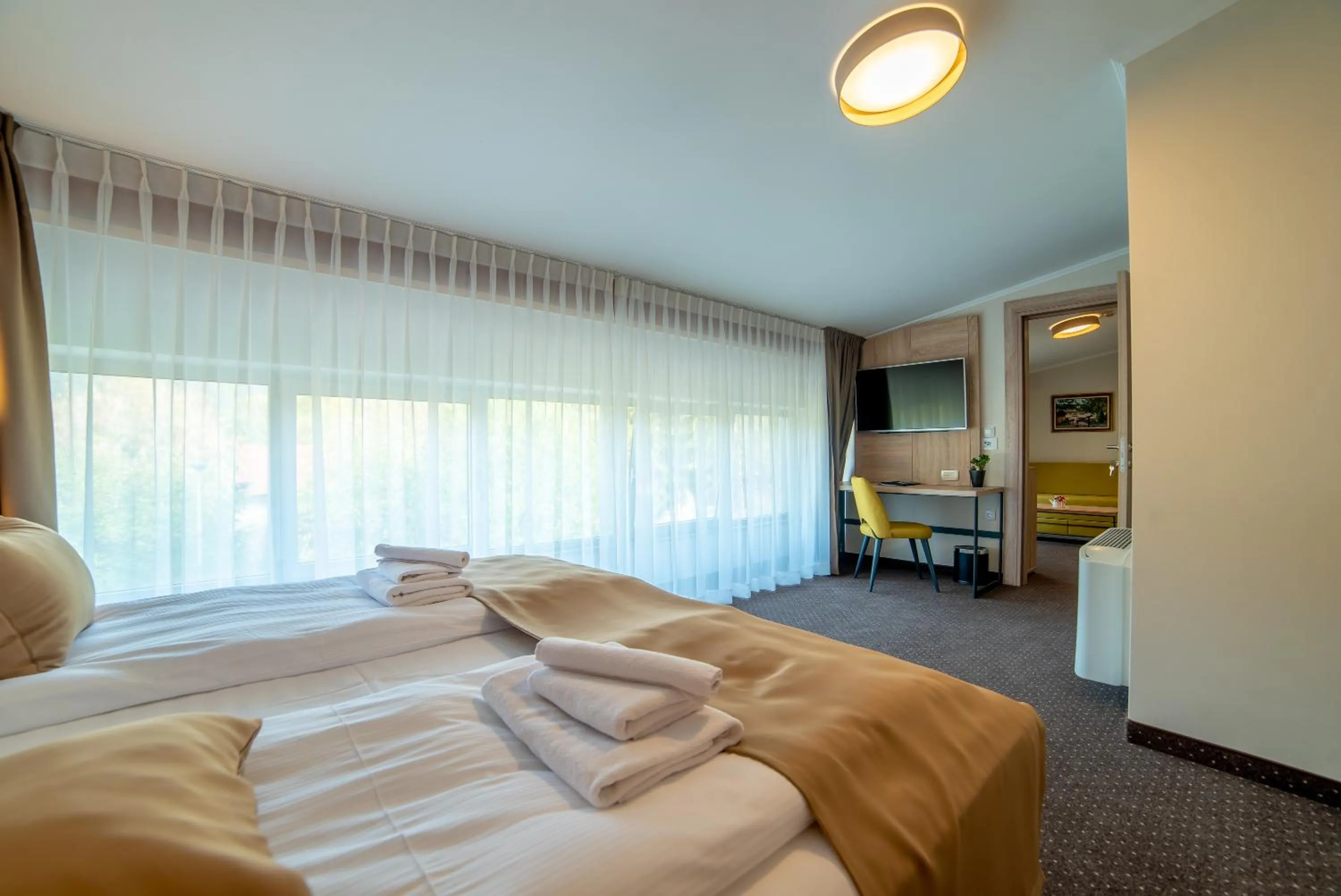 Bed in Hotel Soni Lux