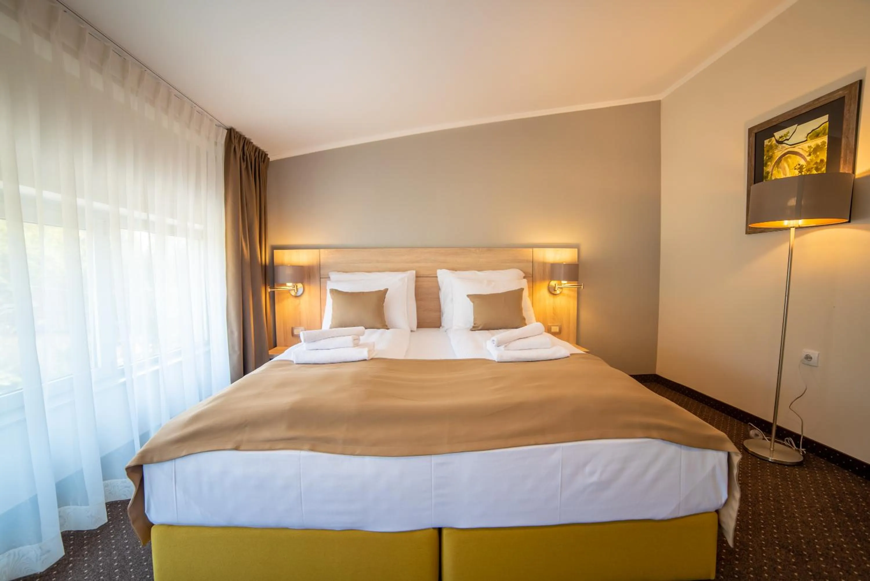 Bed in Hotel Soni Lux