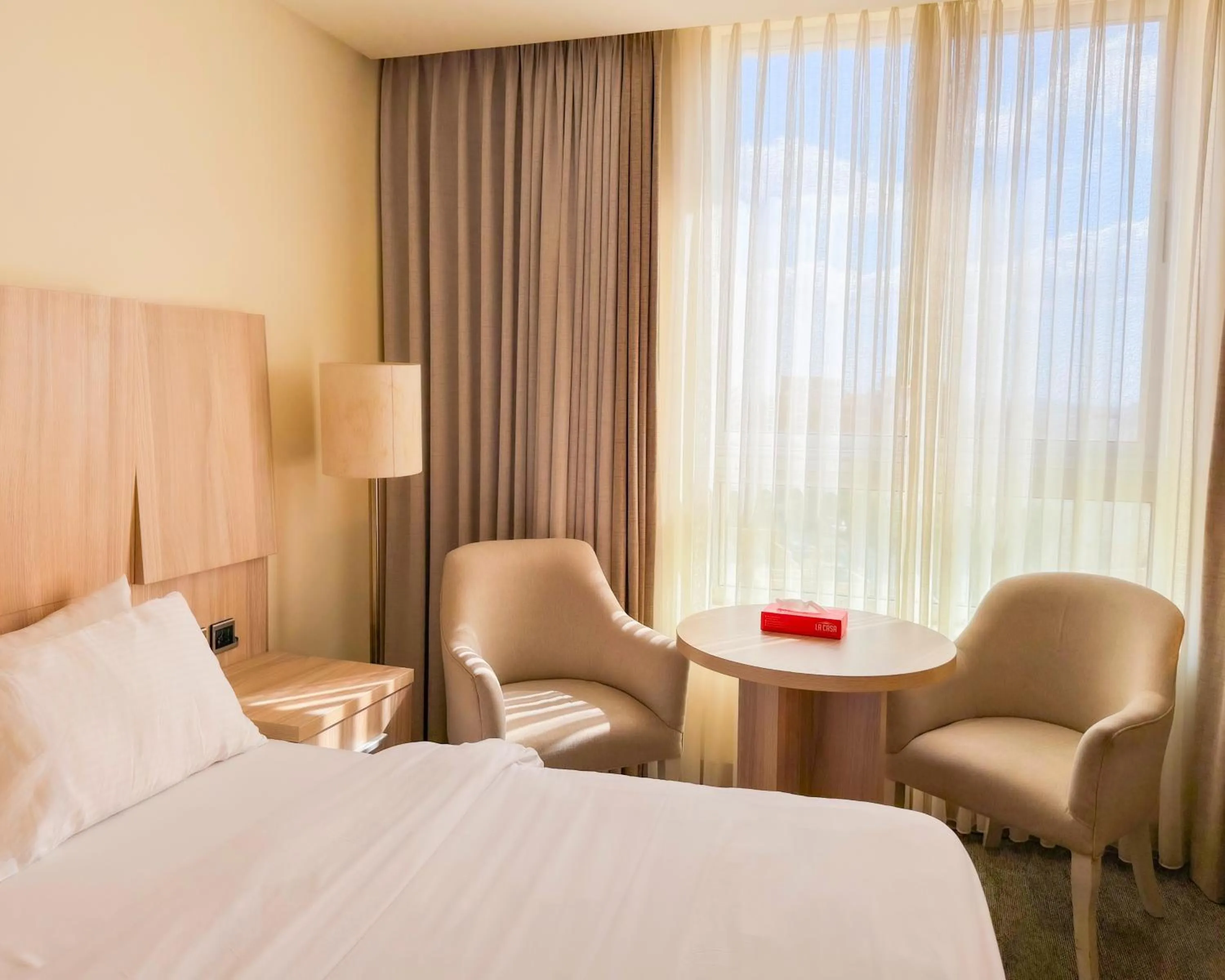 View (from property/room), Bed in La Casa Hotel Amman by FHM