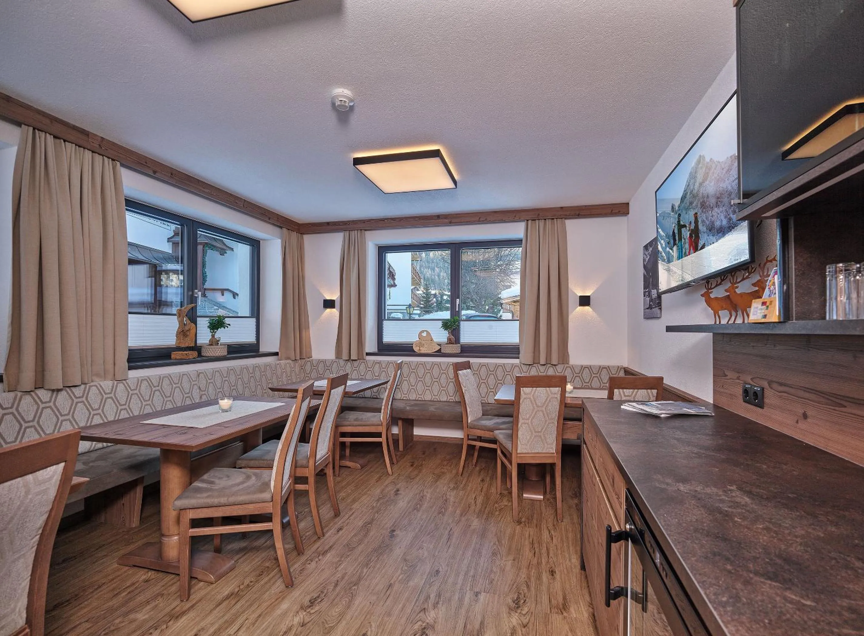 Communal lounge/ TV room in Apart Montagna