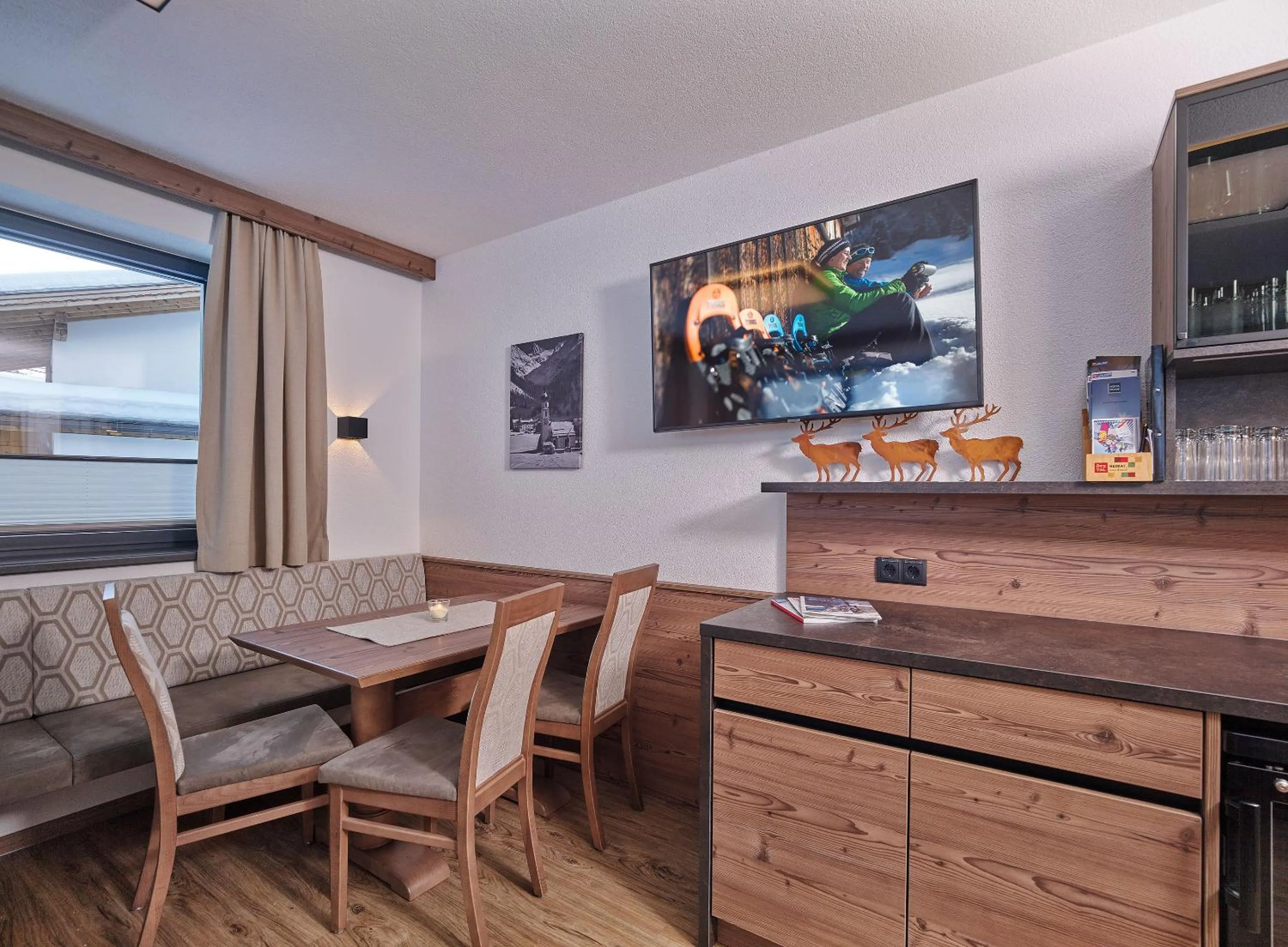 Communal lounge/ TV room in Apart Montagna