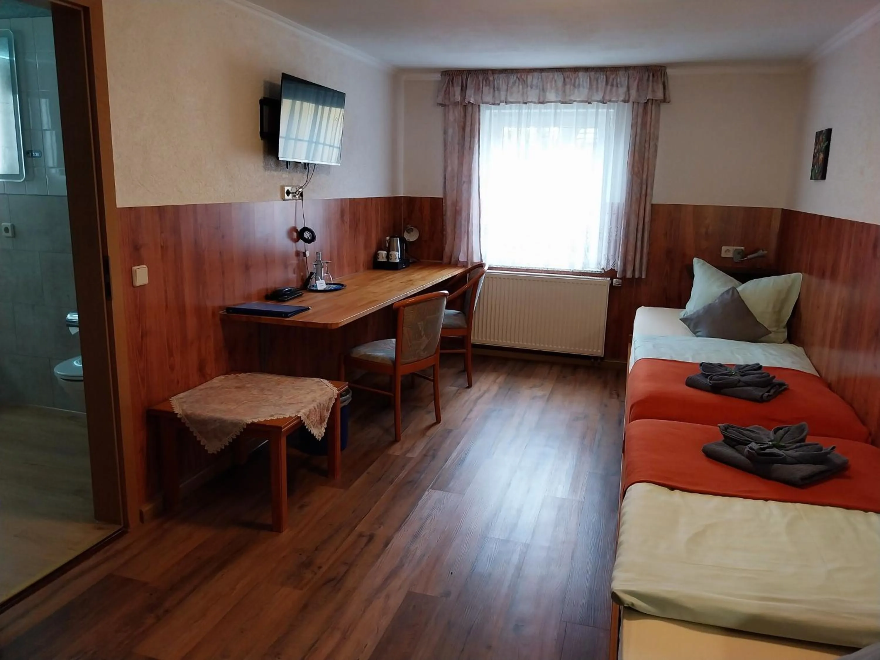 Bed in Landhotel Waldschlößchen mit Gaststube