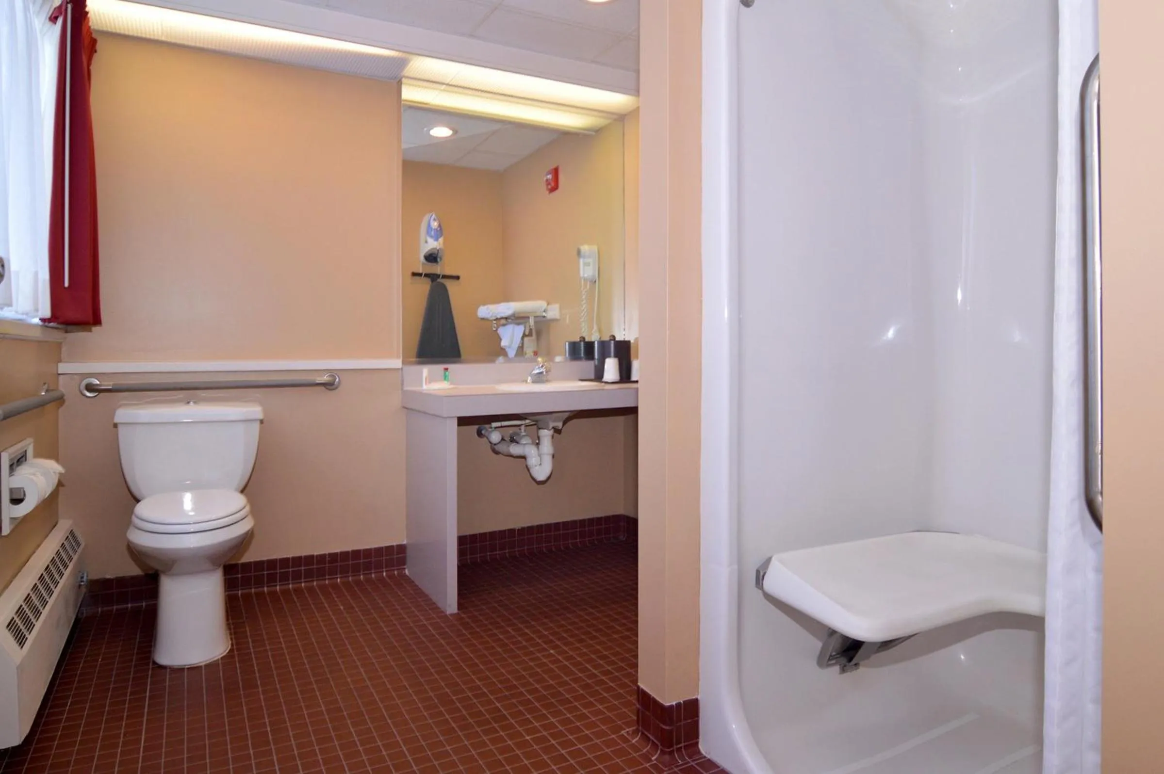 Bathroom in Ramada by Wyndham Seekonk Providence Area
