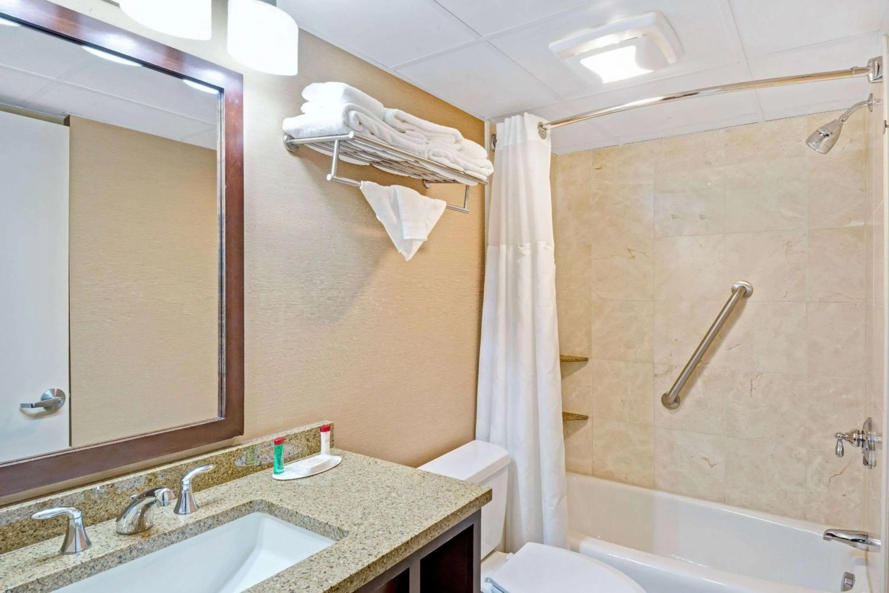 Bathroom in Ramada by Wyndham Seekonk Providence Area