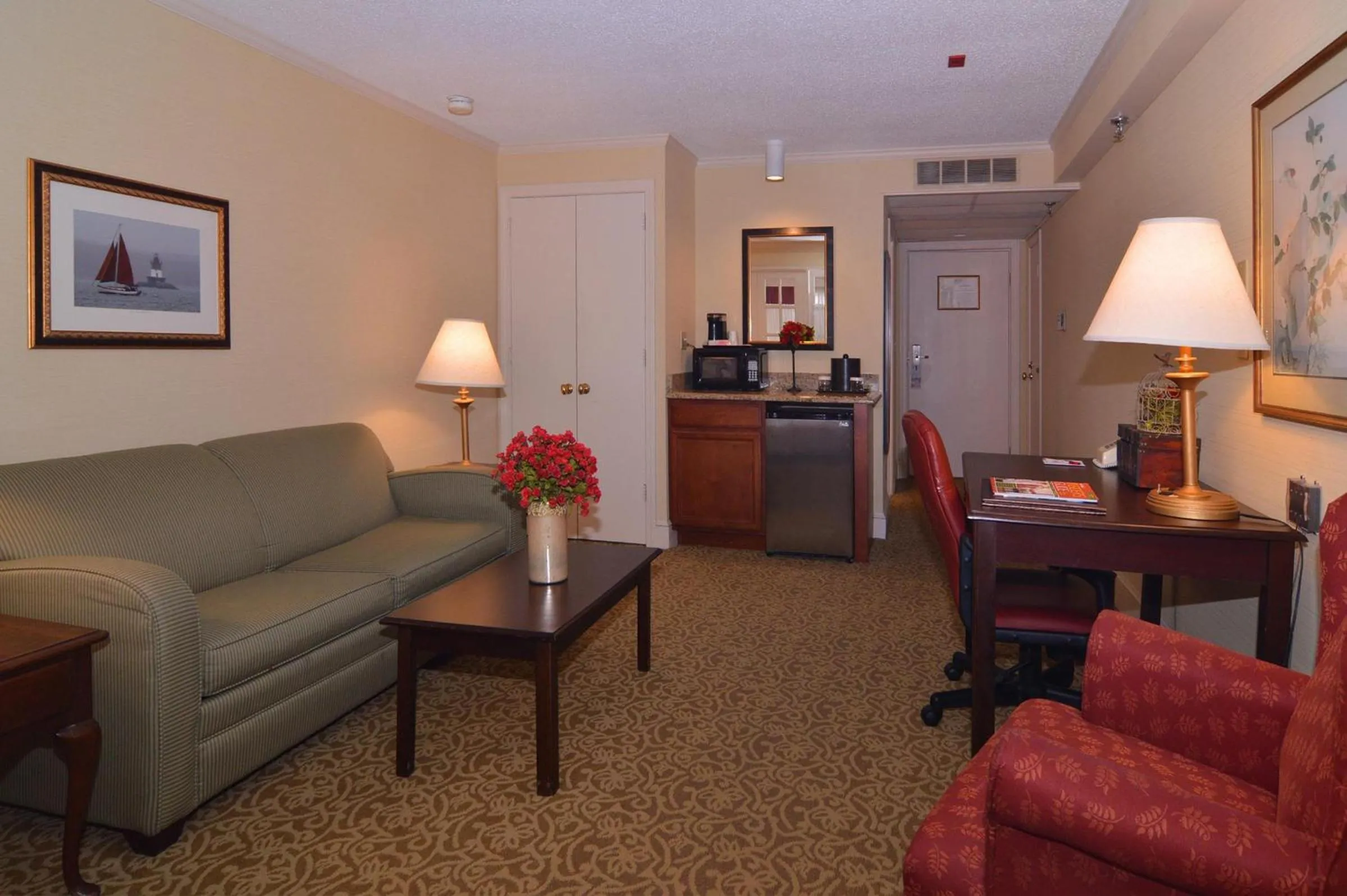 Living room in Ramada by Wyndham Seekonk Providence Area