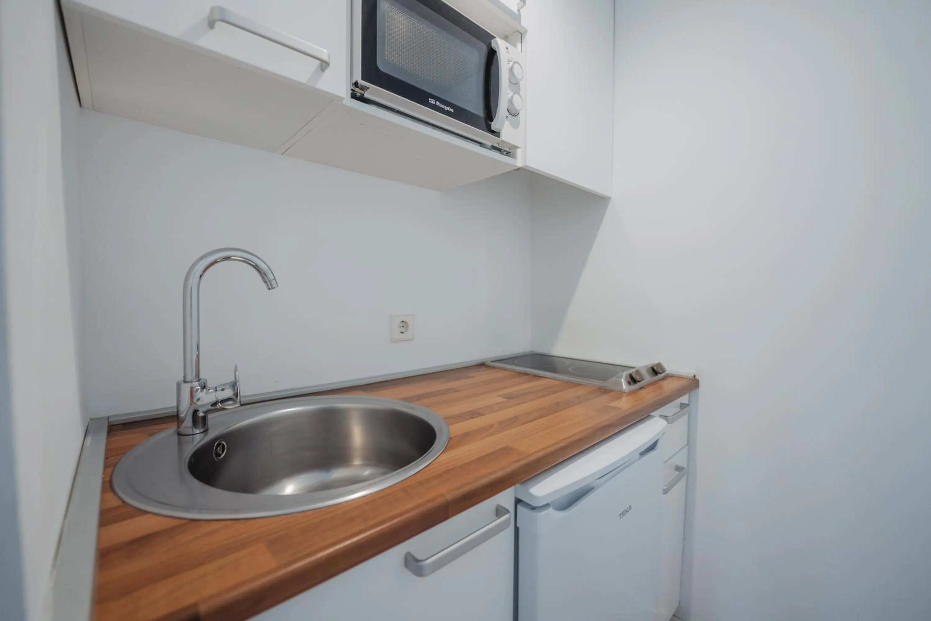 Kitchen or kitchenette in Aparthotel Ses Fotges