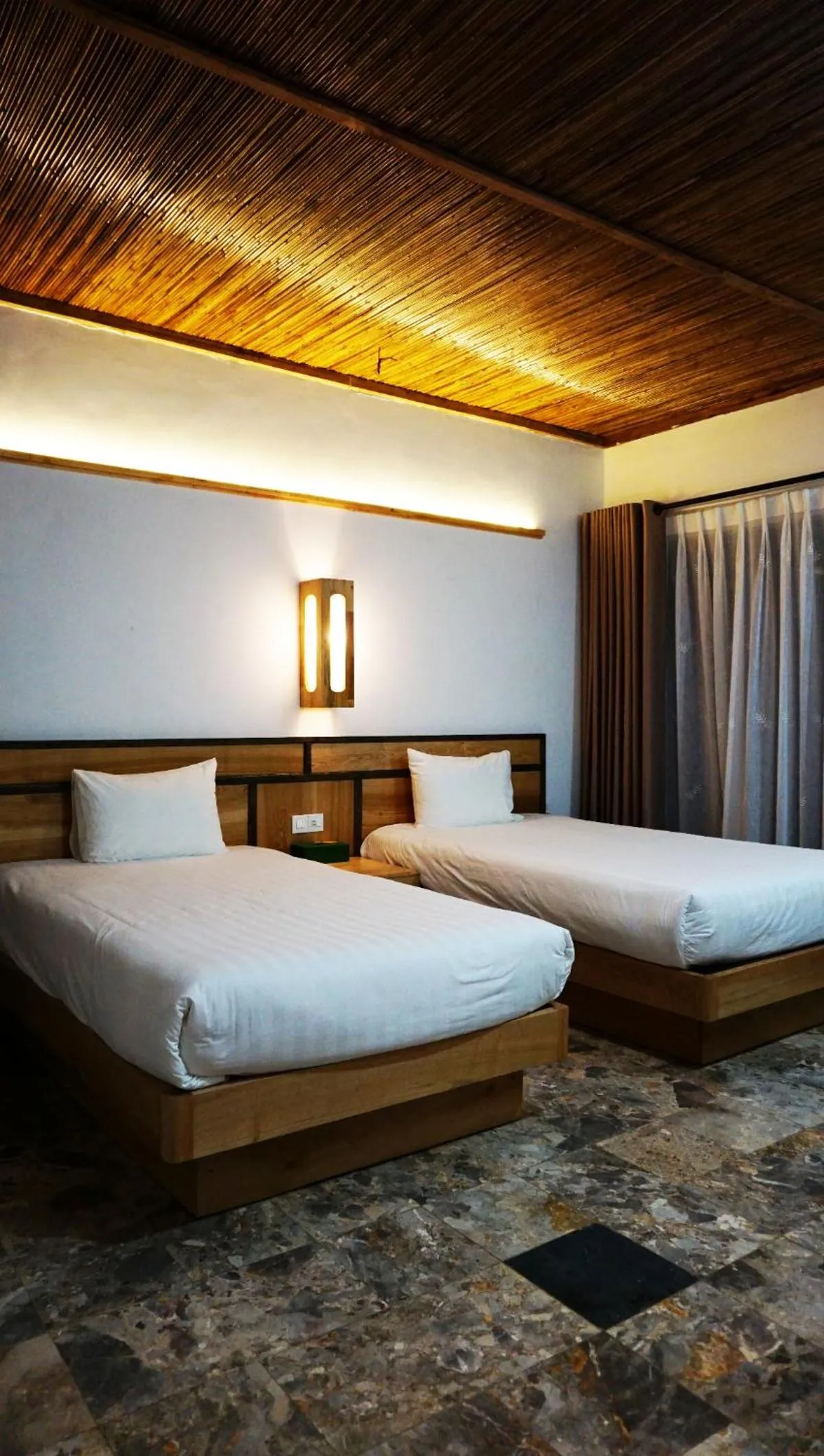 Bed in Bakhan Village Resort