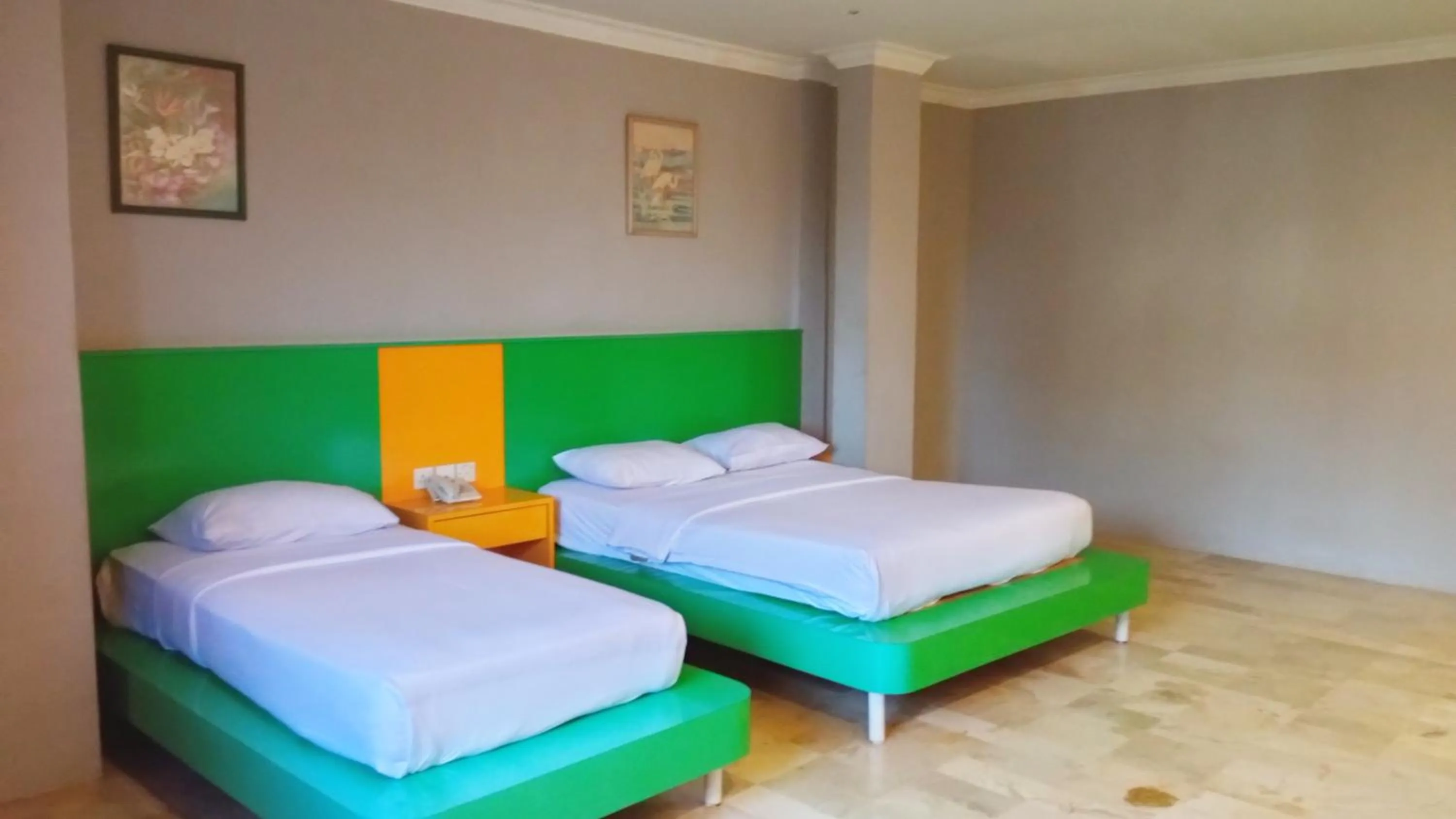 Bed in Kita Hotel