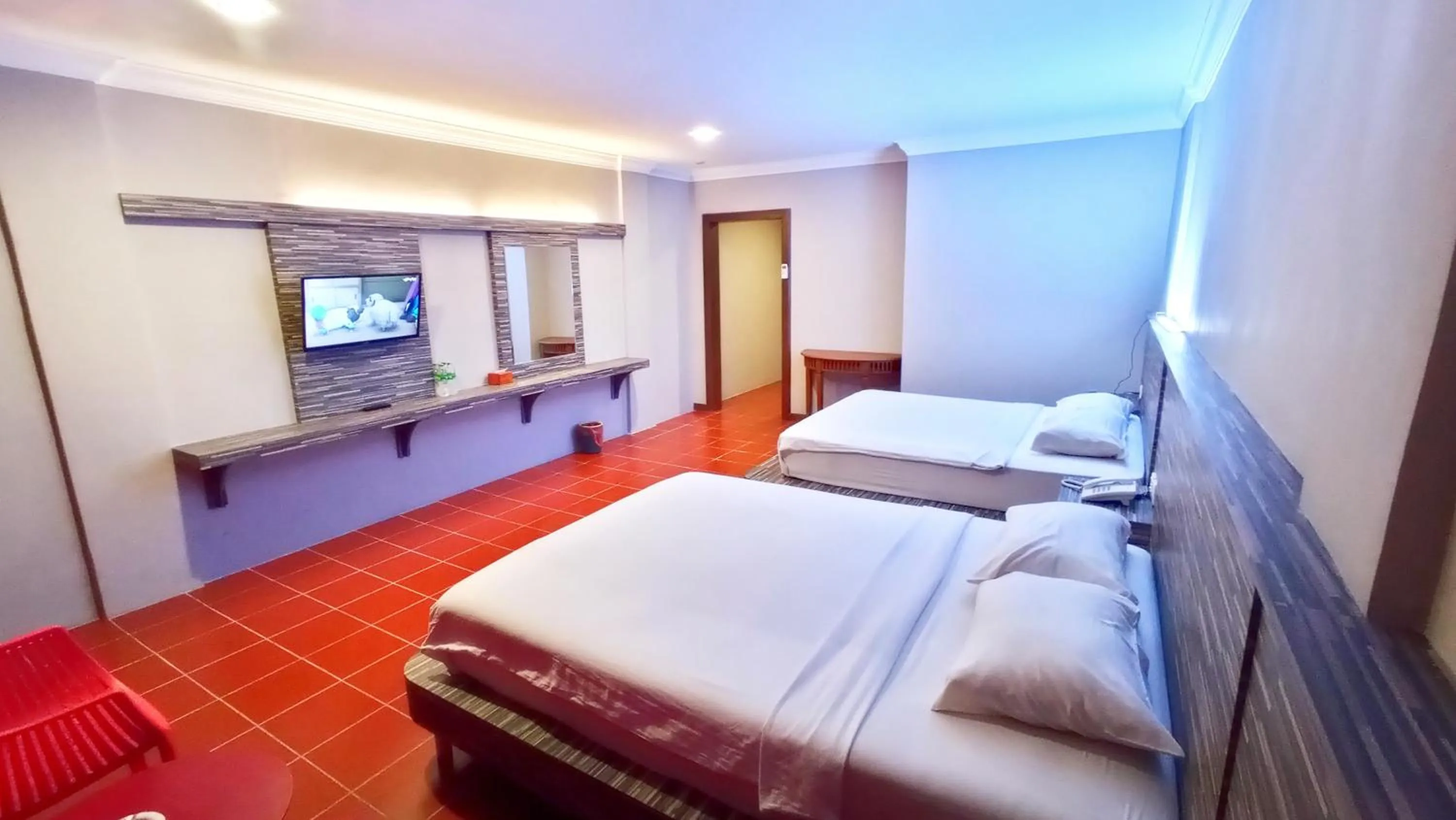 Bed in Kita Hotel