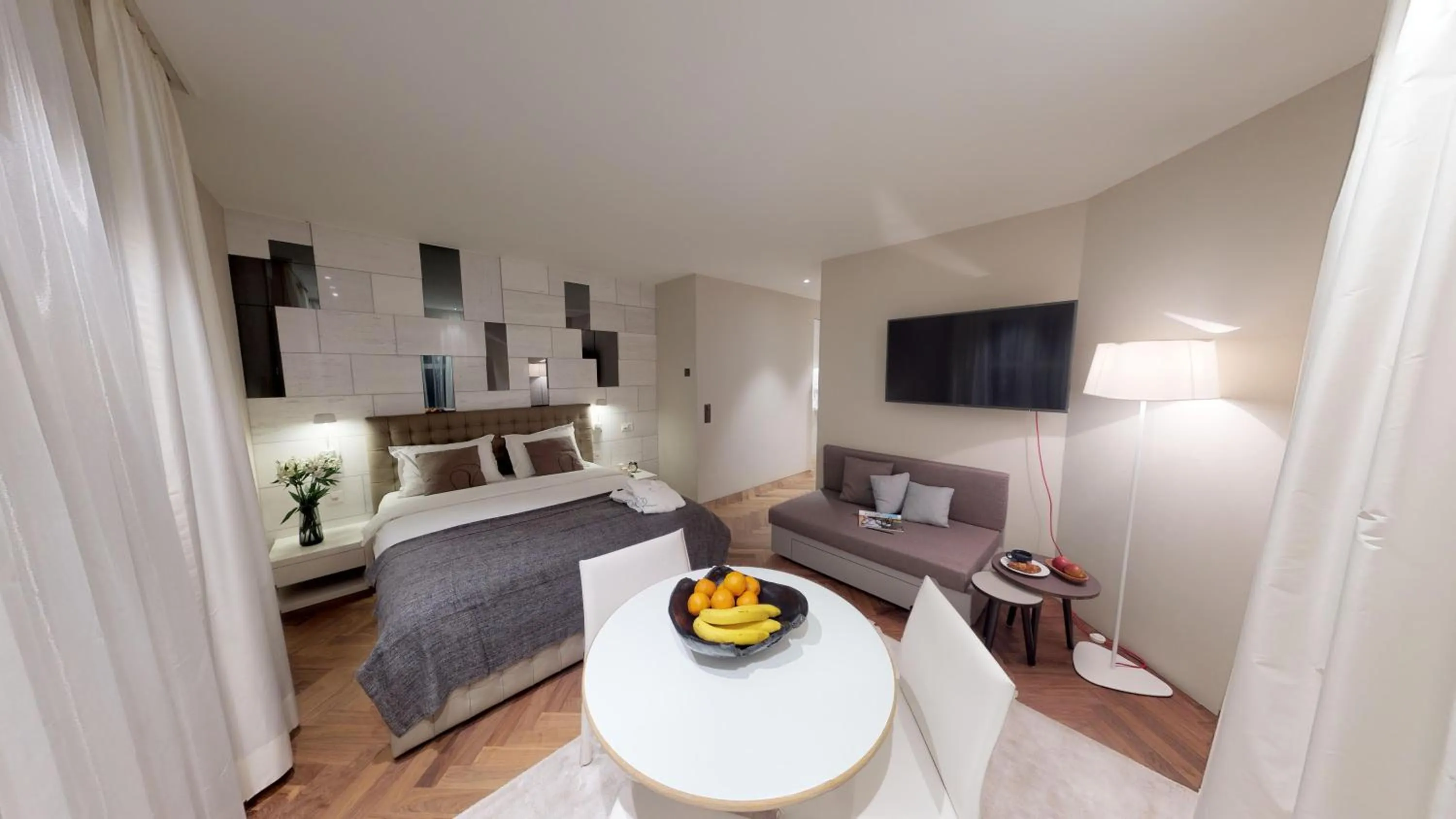 Living room, Bed in VISIONAPARTMENTS Bellariastrasse - contactless check-in
