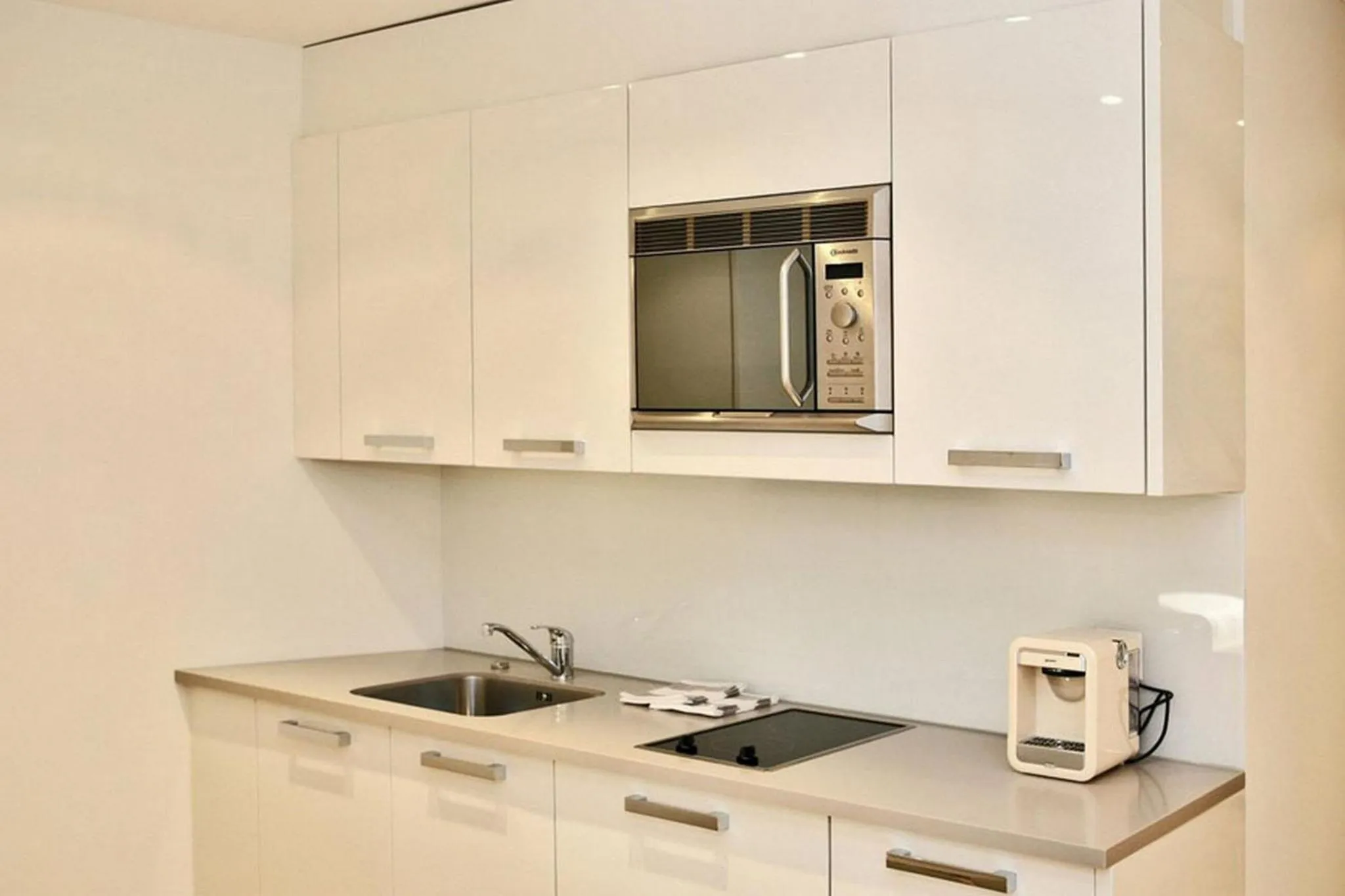 Kitchen or kitchenette in VISIONAPARTMENTS Bellariastrasse - contactless check-in