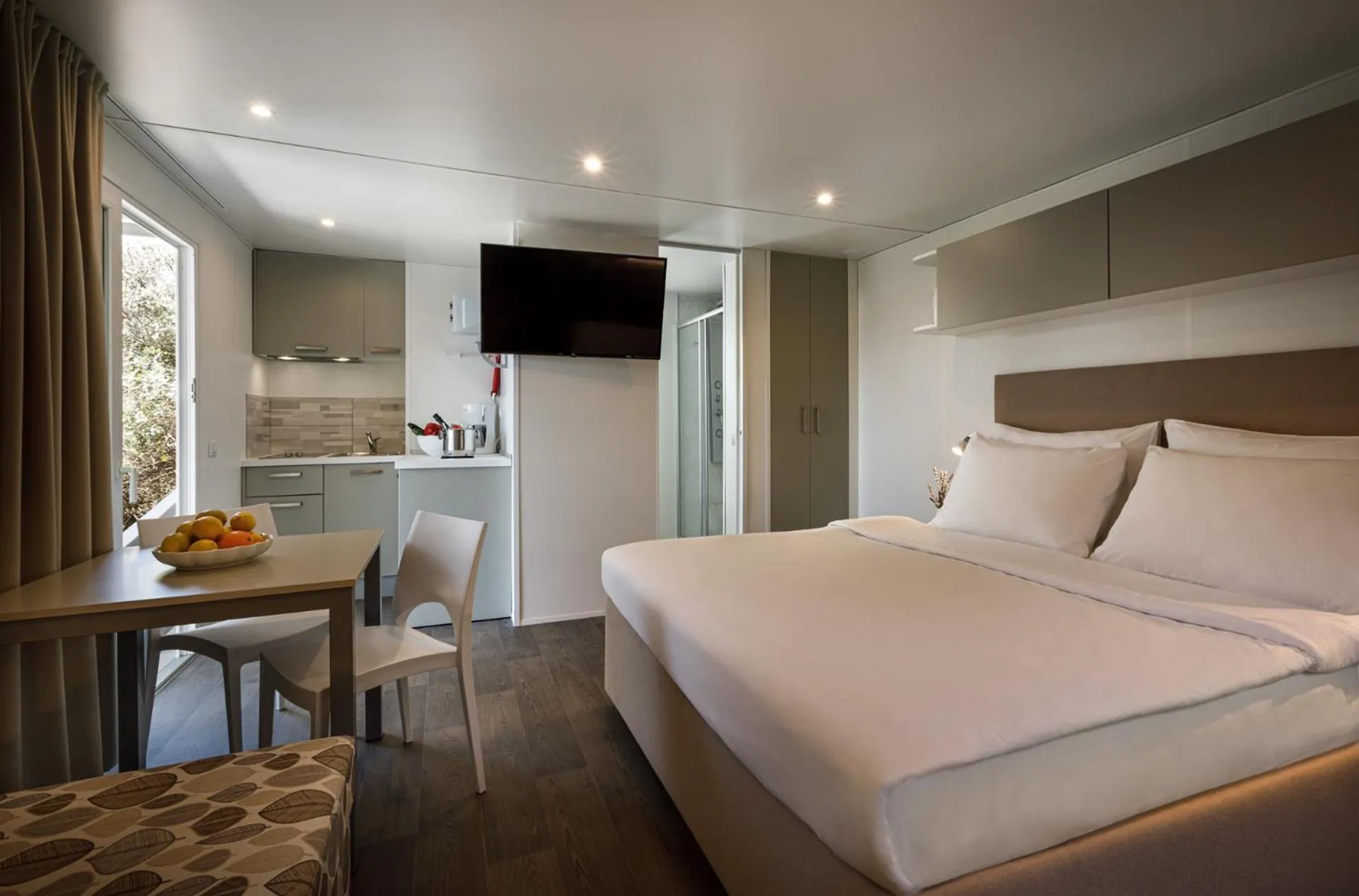 Living room, Bed in Maistra Camping Koversada Uncovered Naturist Mobile homes