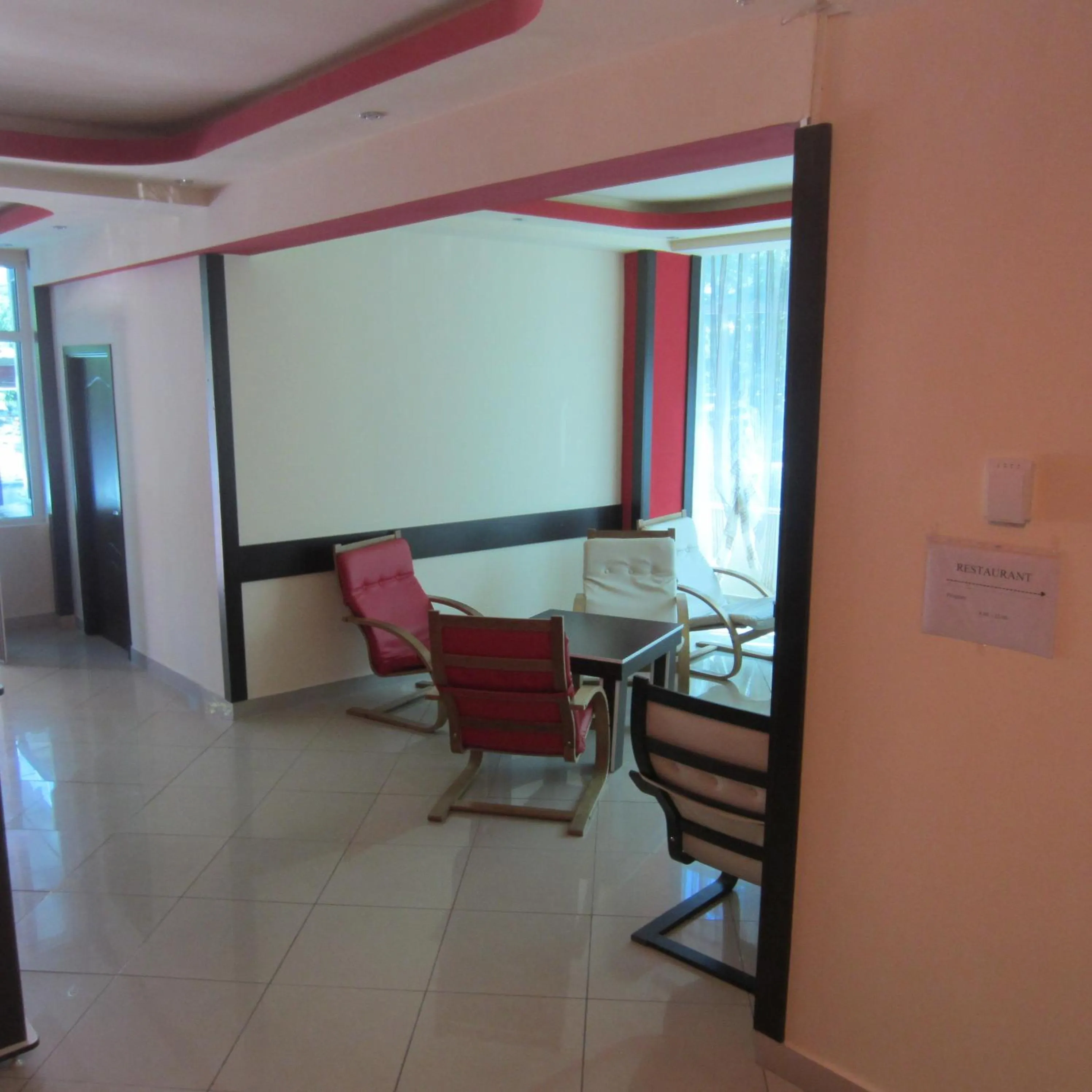 Communal lounge/ TV room in Hotel Regal