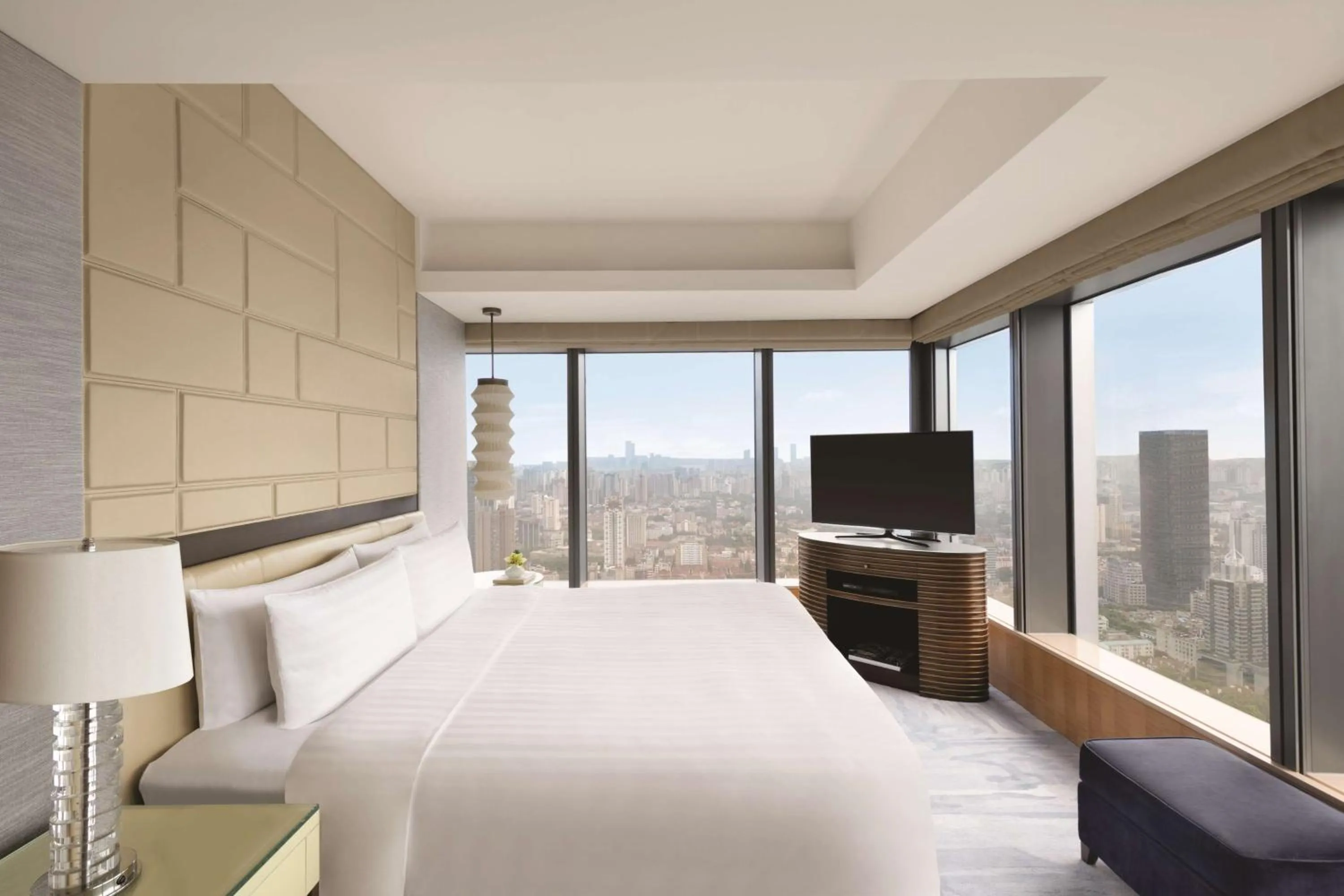 Photo of the whole room, Bed in Jing An Shangri-La, Shanghai - sits centrally amid Puxi's iconic landmarks, uniquely positioned nearby Jing'an Temple