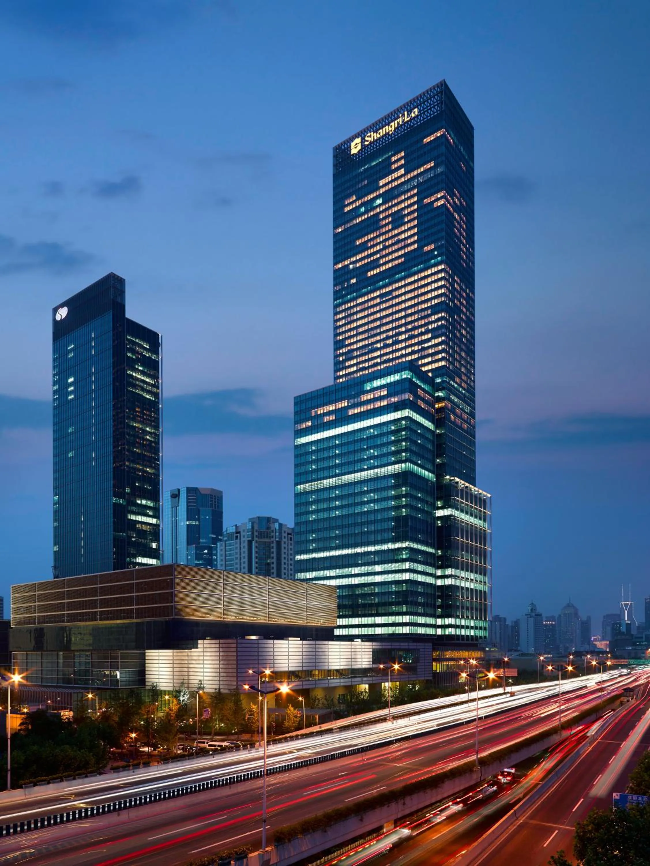 Facade/entrance in Jing An Shangri-La, Shanghai - sits centrally amid Puxi's iconic landmarks, uniquely positioned nearby Jing'an Temple