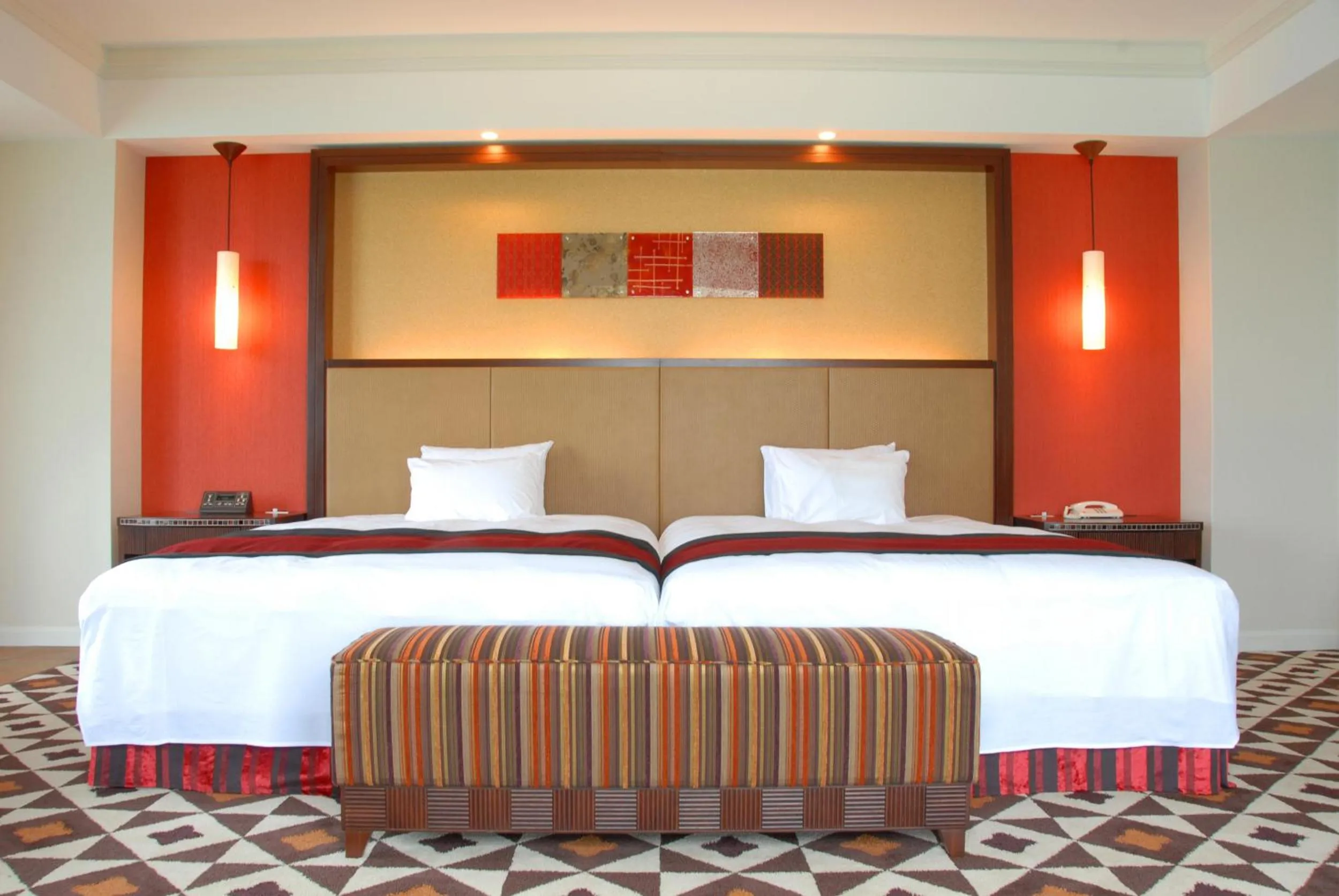 Bed in Hotel Nikko Alivila