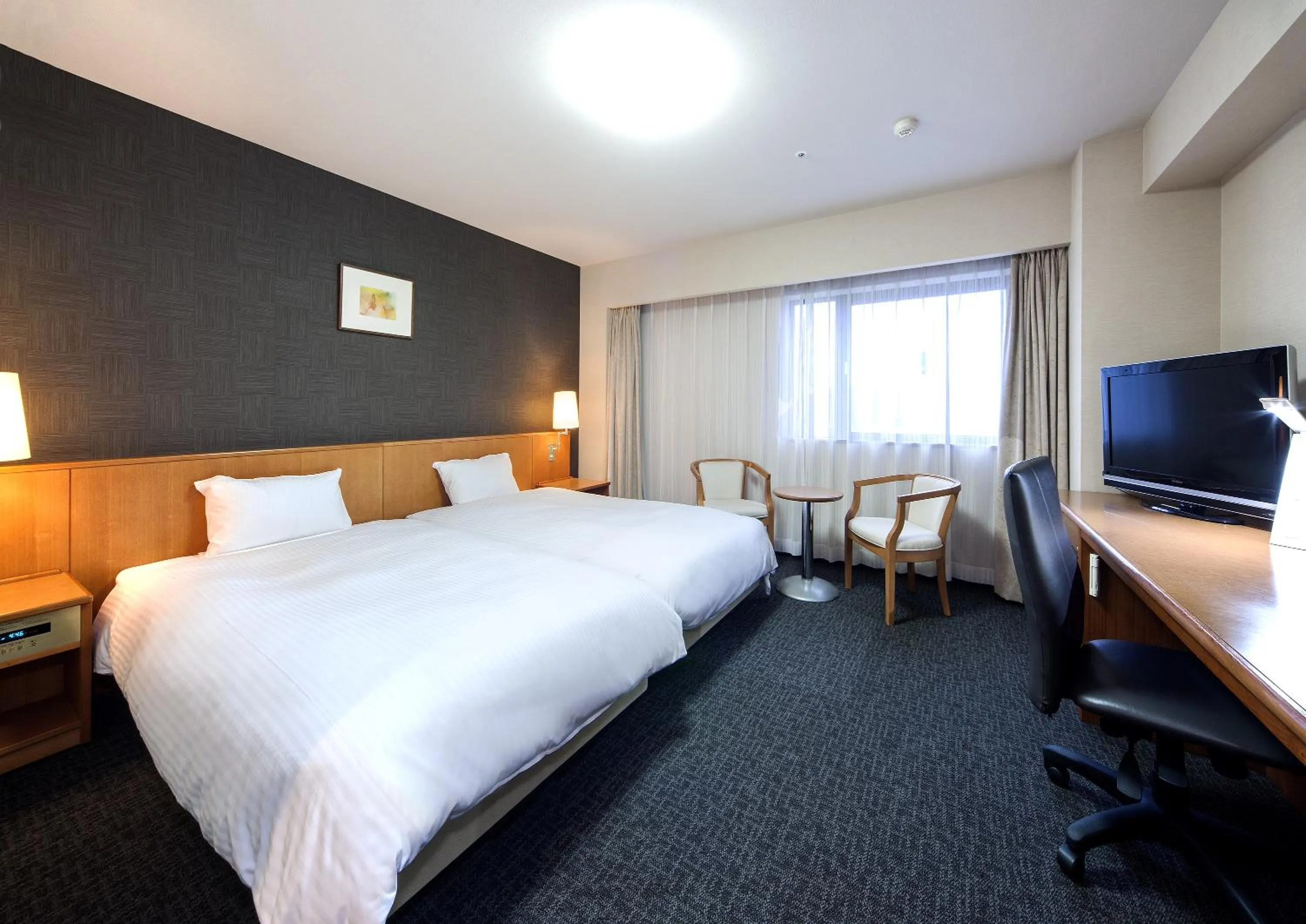 Photo of the whole room, TV/Entertainment Center in Daiwa Roynet Hotel Toyama