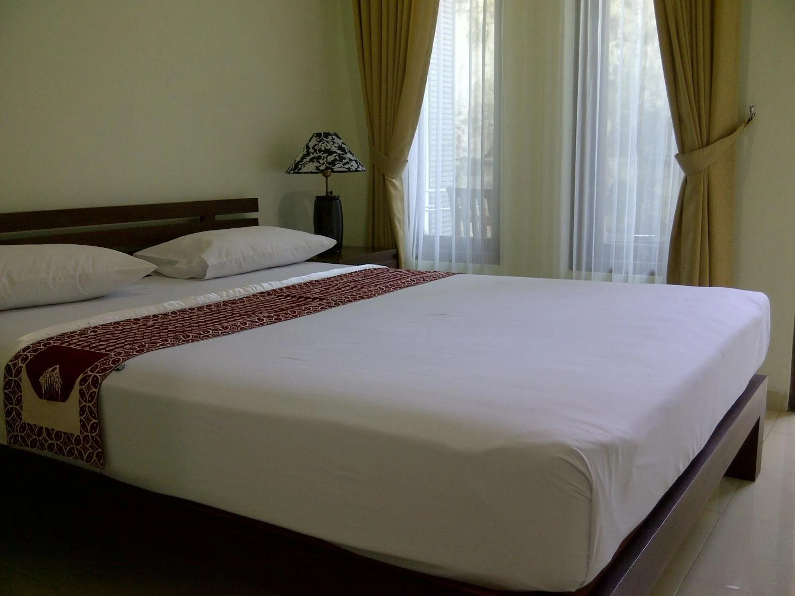 Bed in Puri Pangeran Hotel