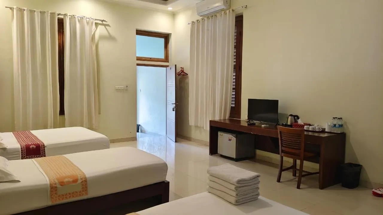 Bed in Puri Pangeran Hotel