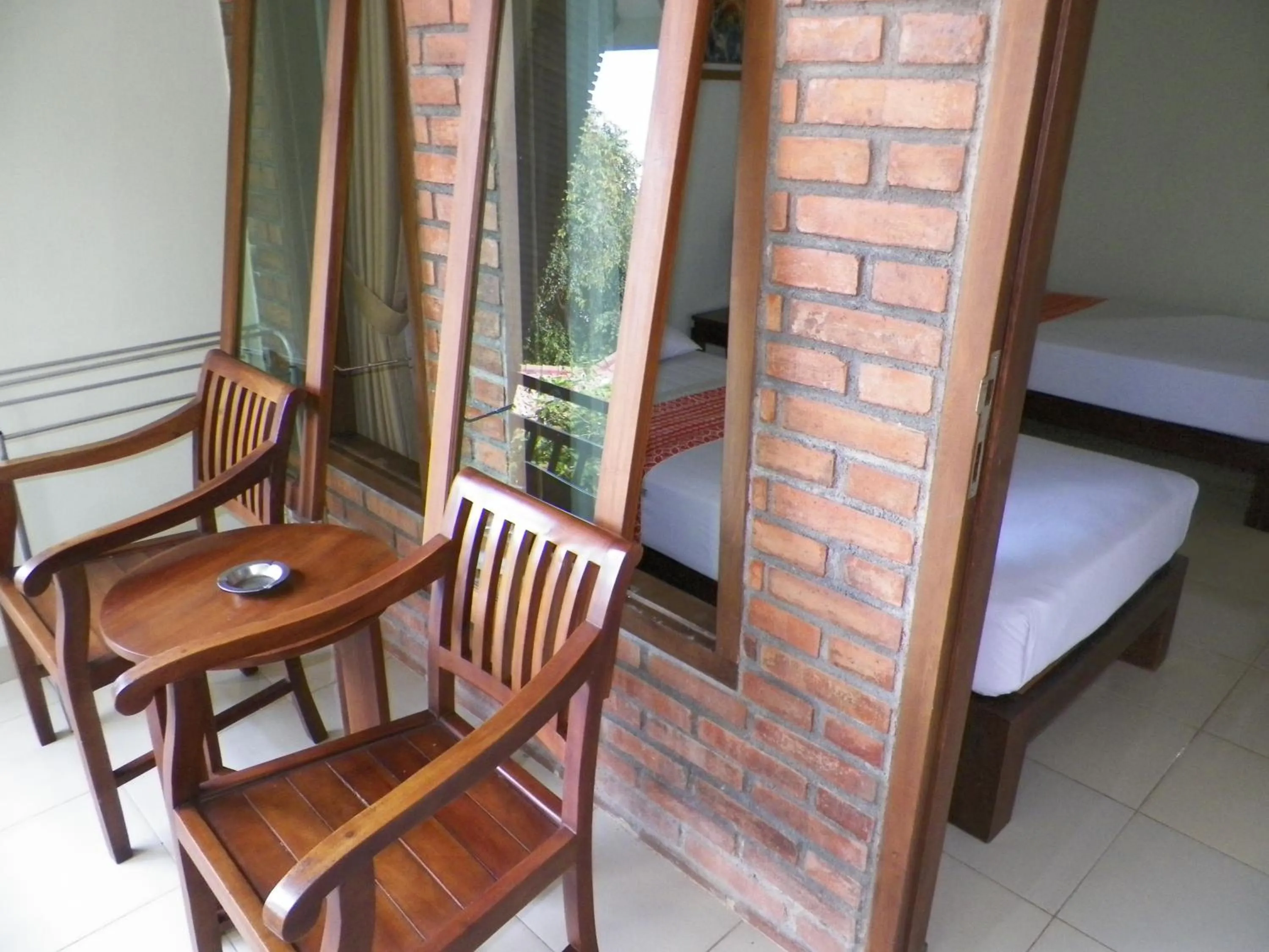 Balcony/Terrace, Bed in Puri Pangeran Hotel
