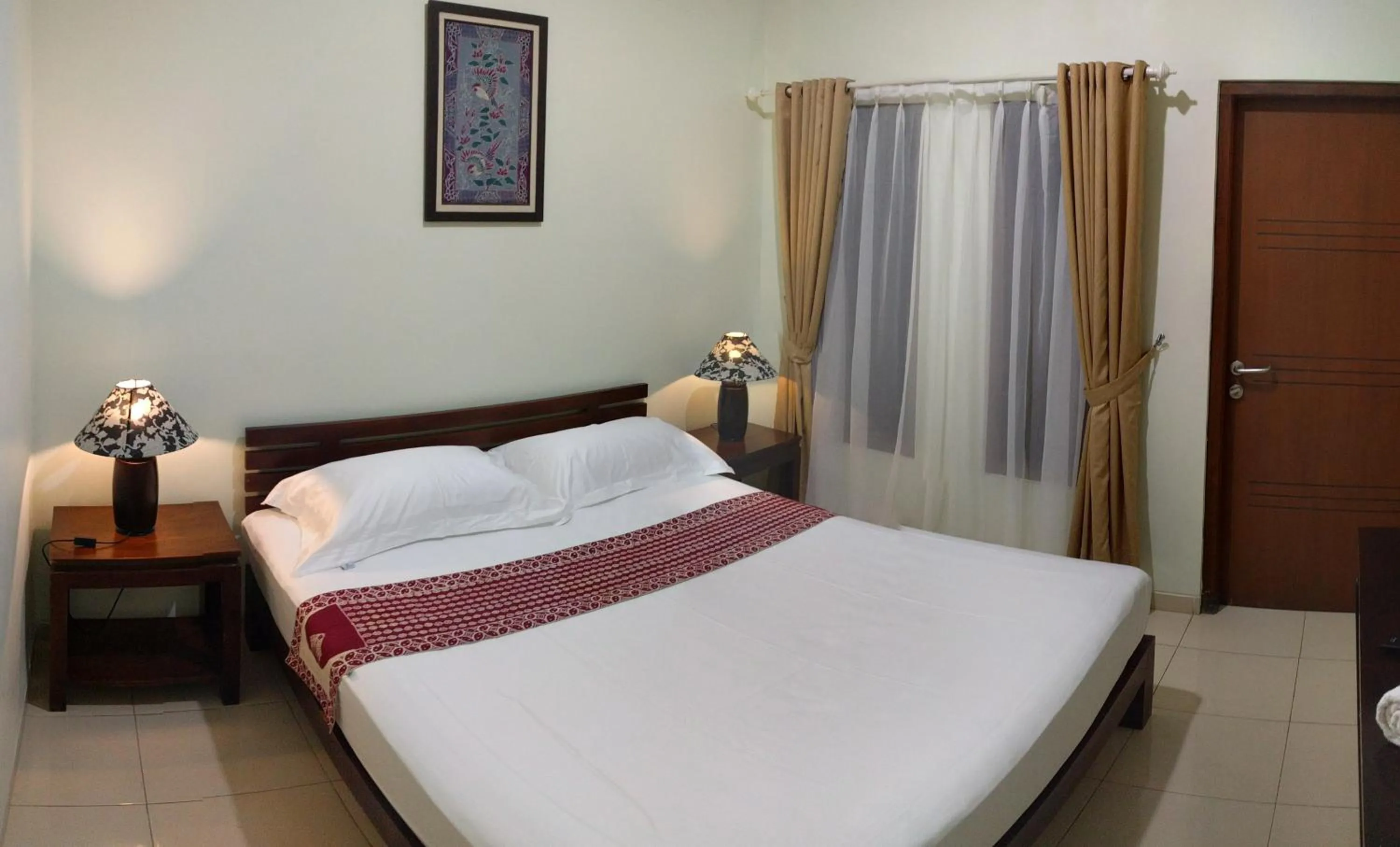 Bed in Puri Pangeran Hotel
