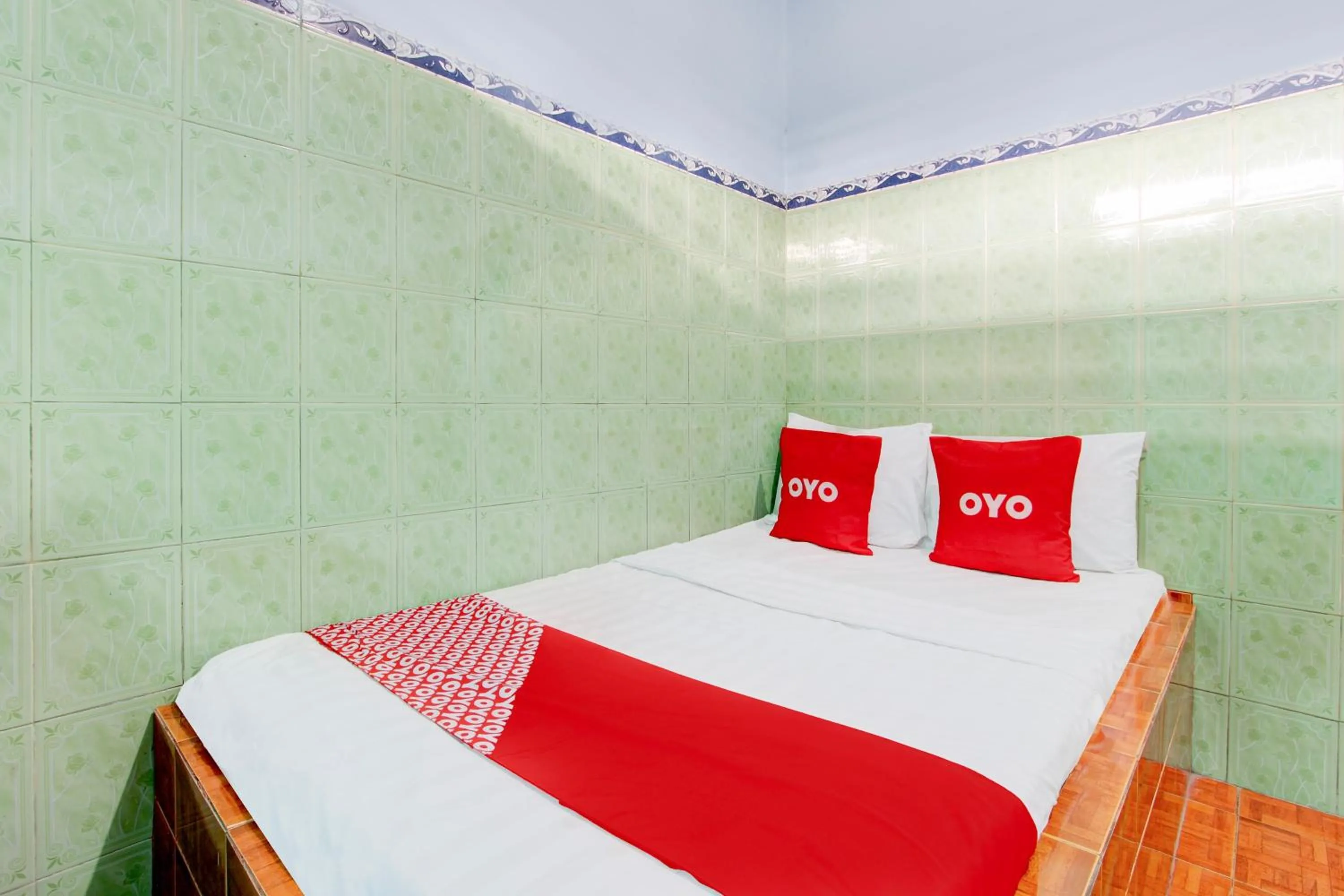 Bedroom, Bed in Hotel O Homestay Baronsari