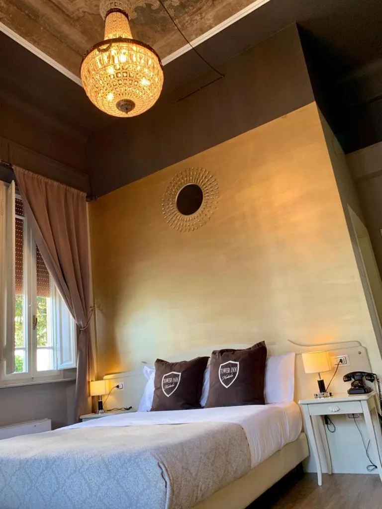 Bed in Villa Tower Inn