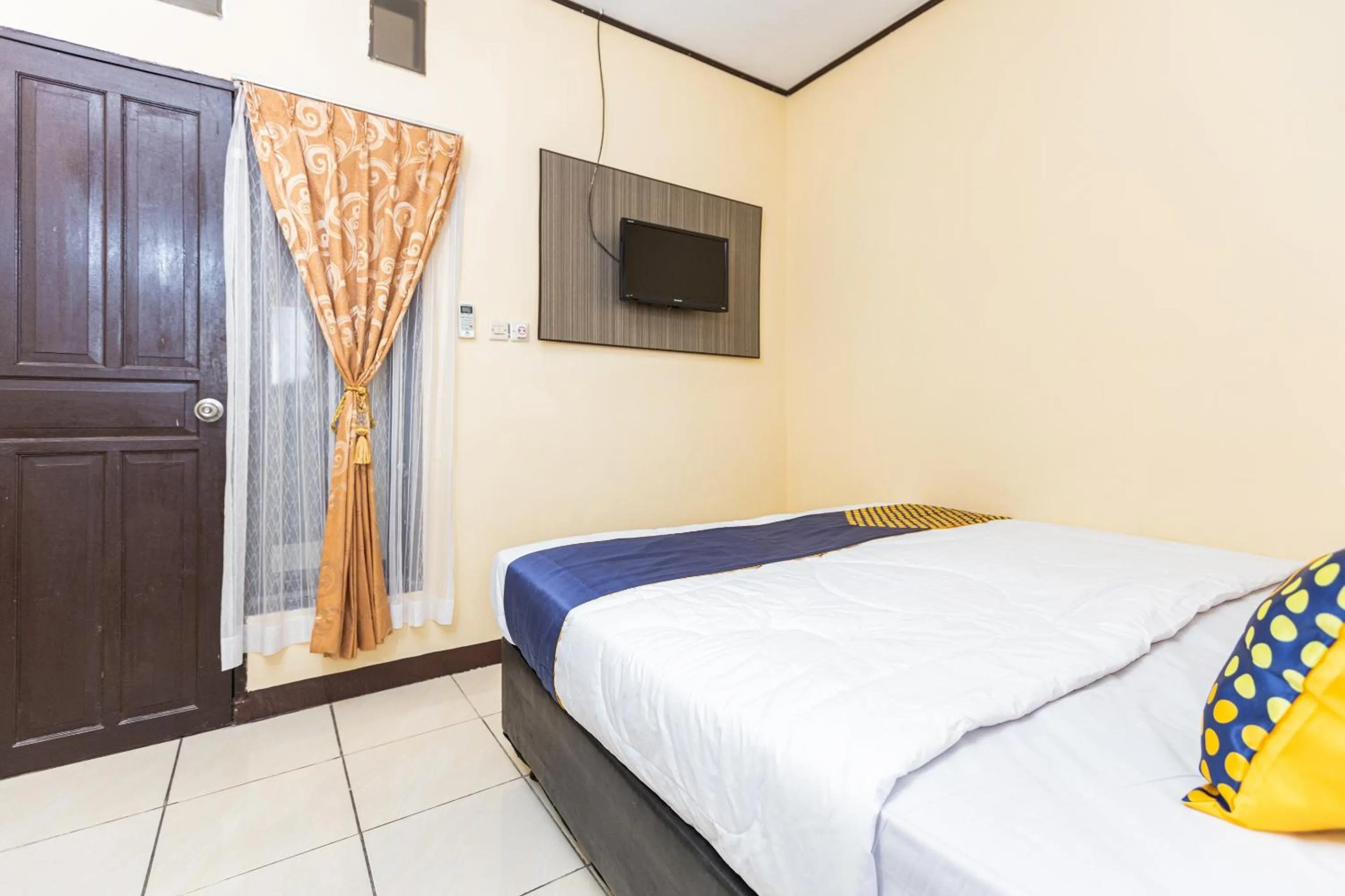 Bedroom in Hotel O Pondok Ripuji