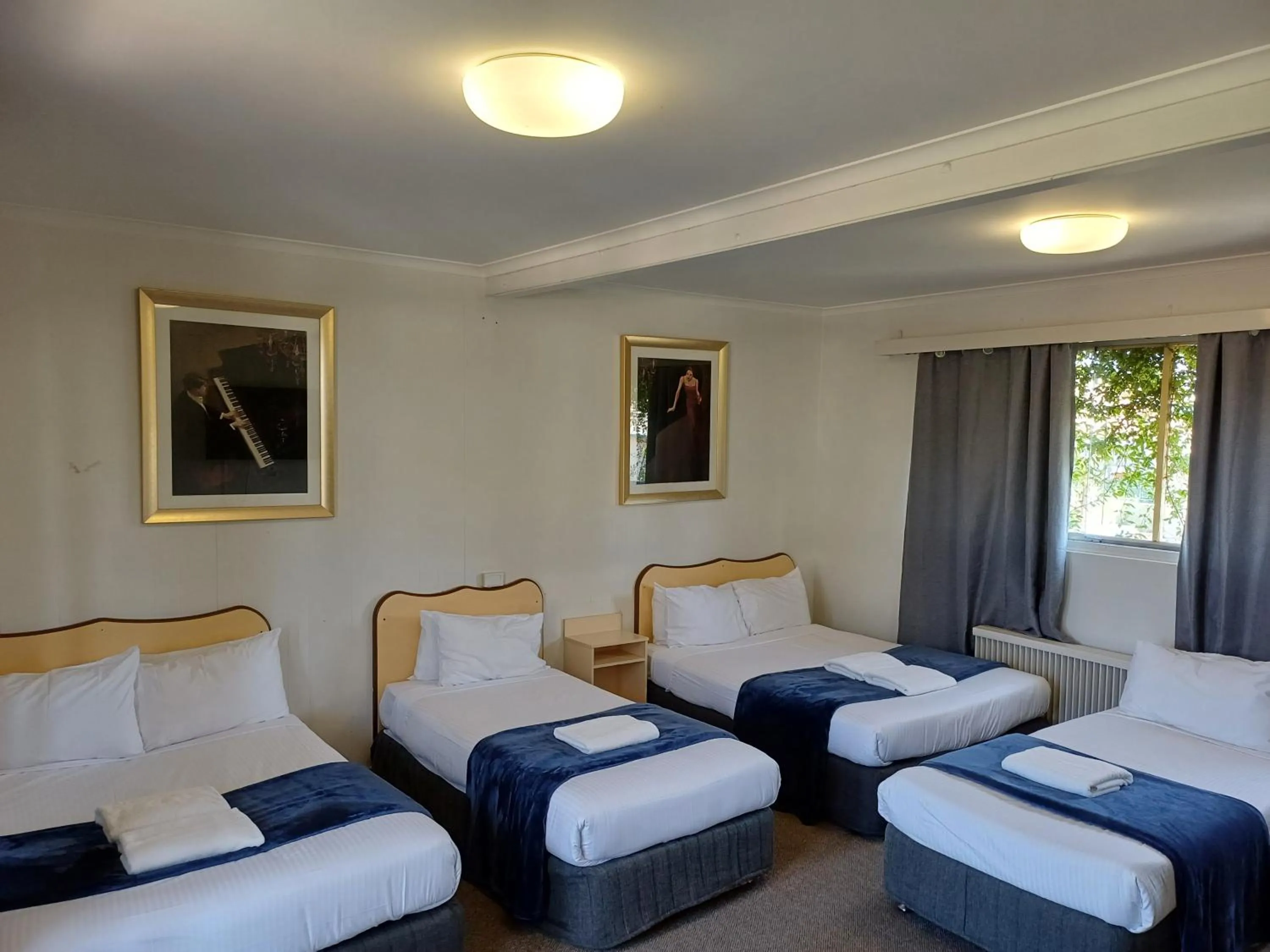 Bed in Billabong Motel