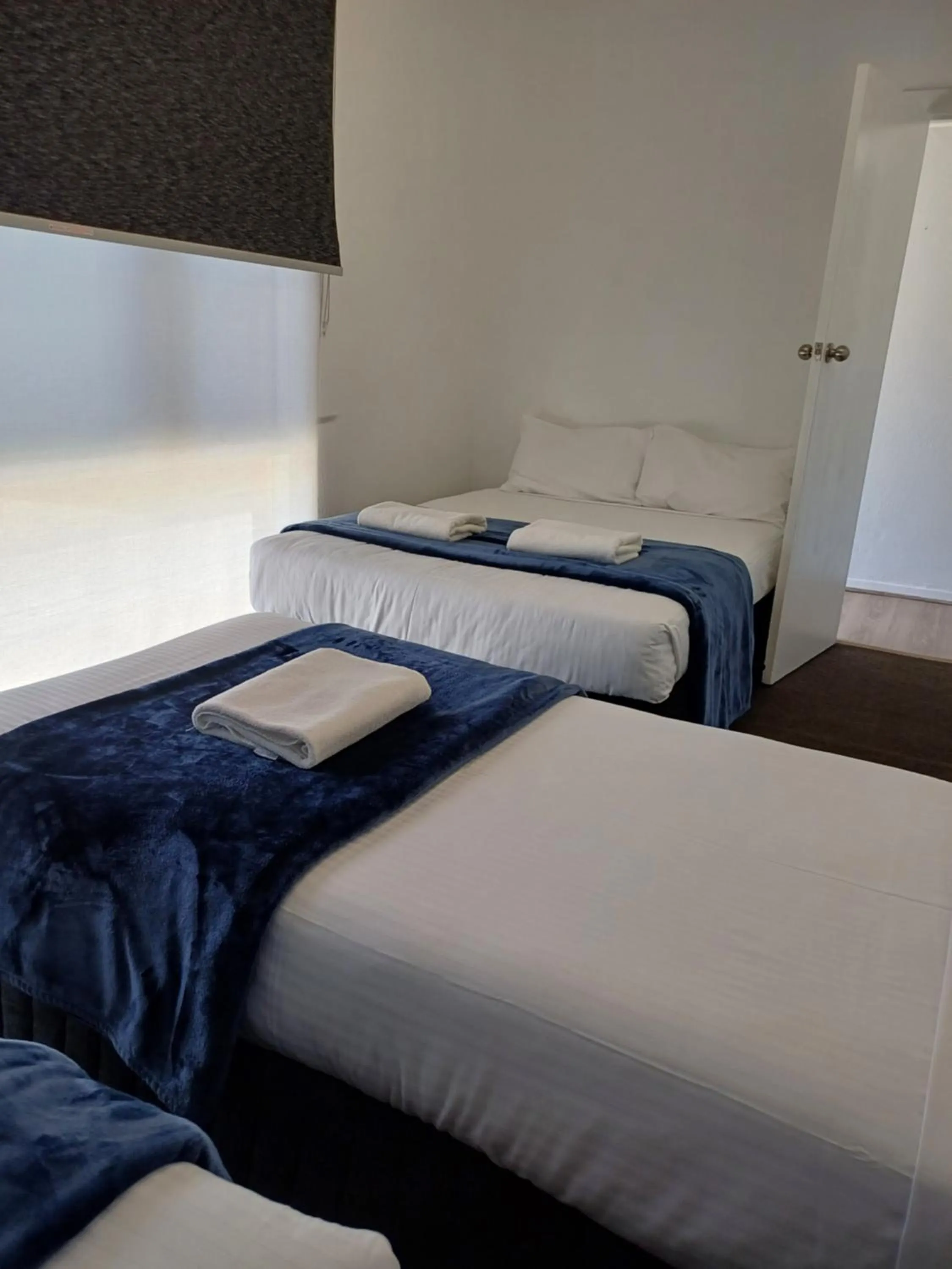 Bed in Billabong Motel