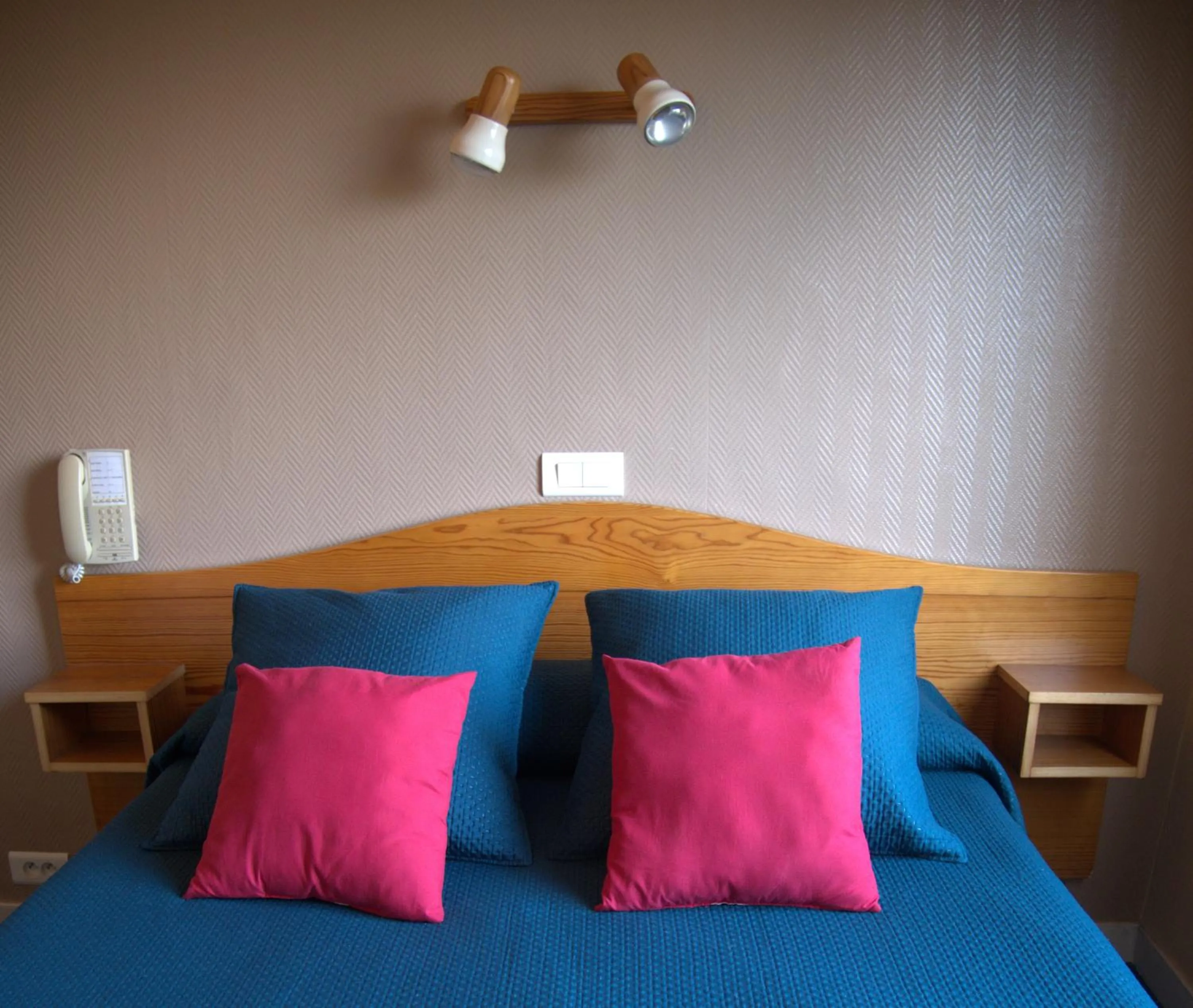 Bed in Hotel le Pasteur