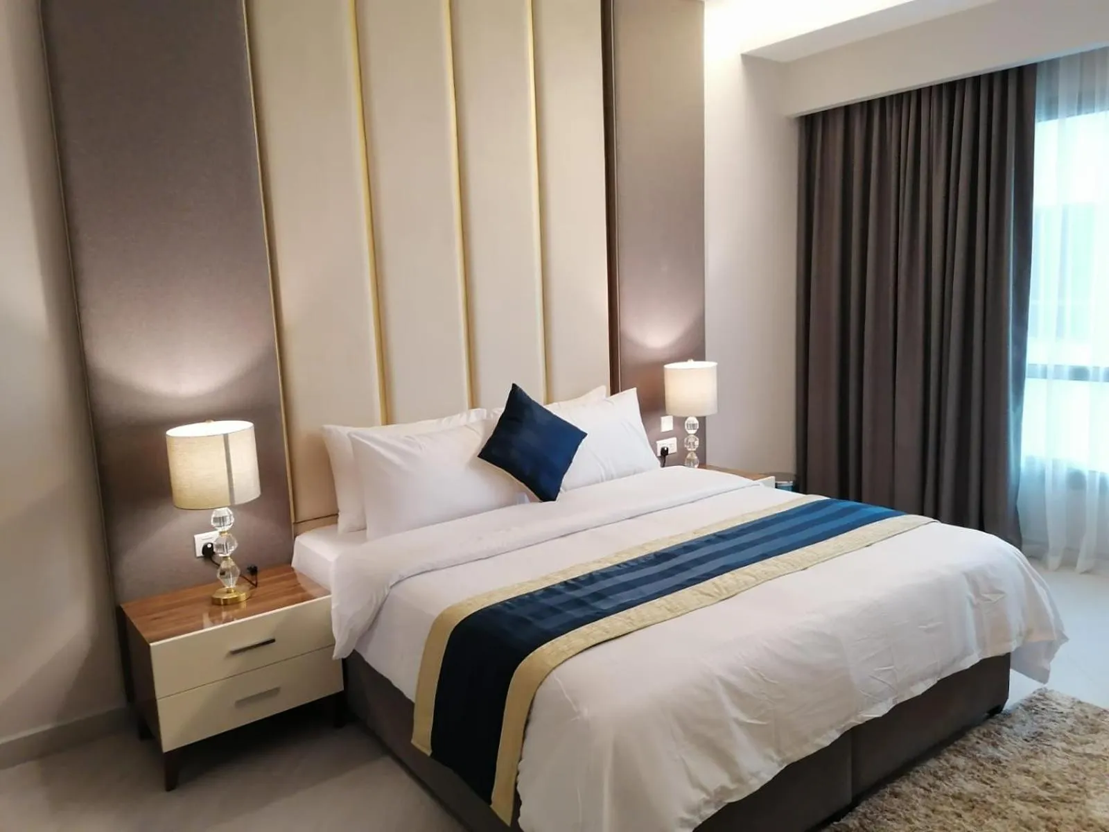 Bed in BW Suites & Spa